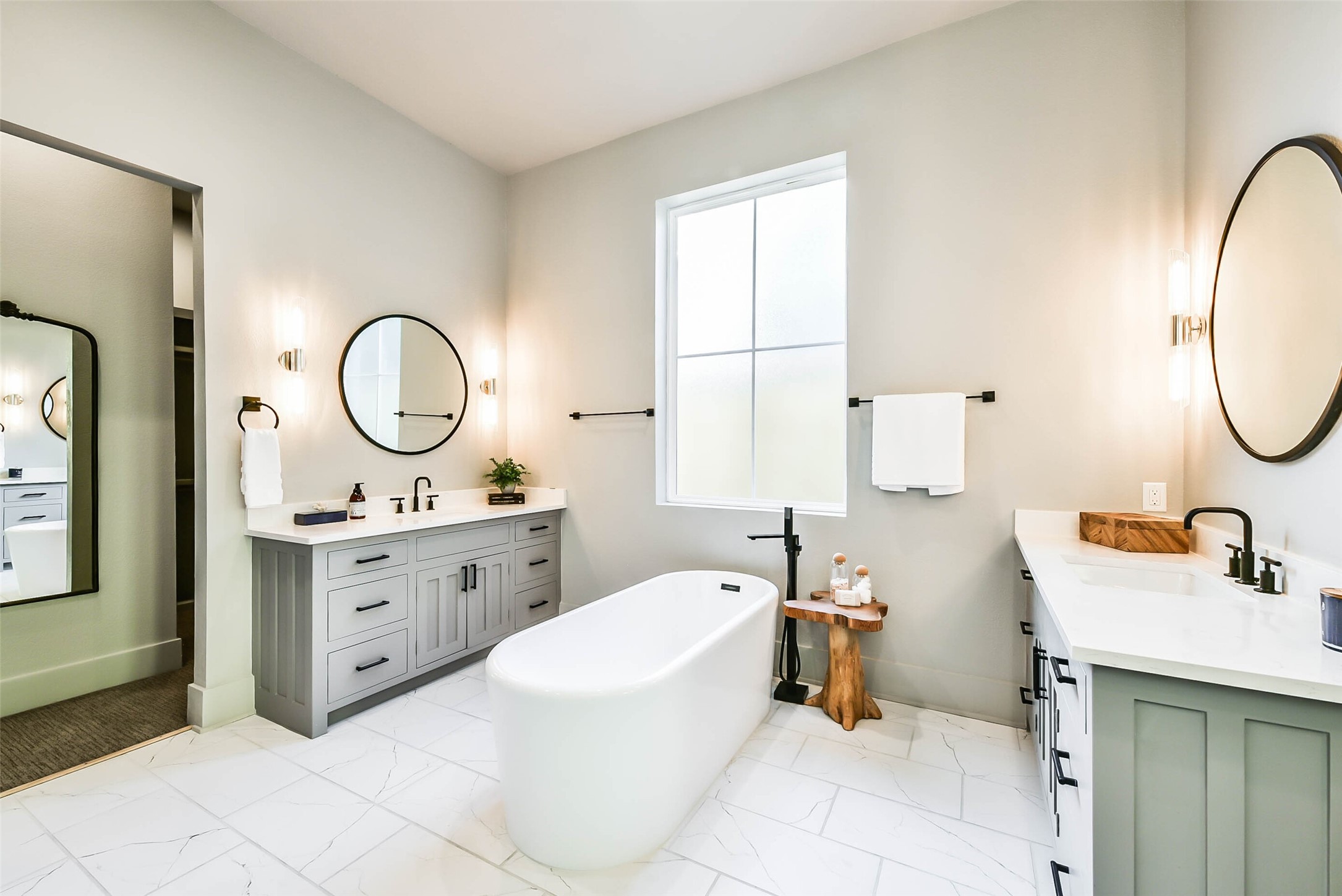Rest and relax in your luxurious soaking tub. Double vanities allow for each owner to have their own personal space.