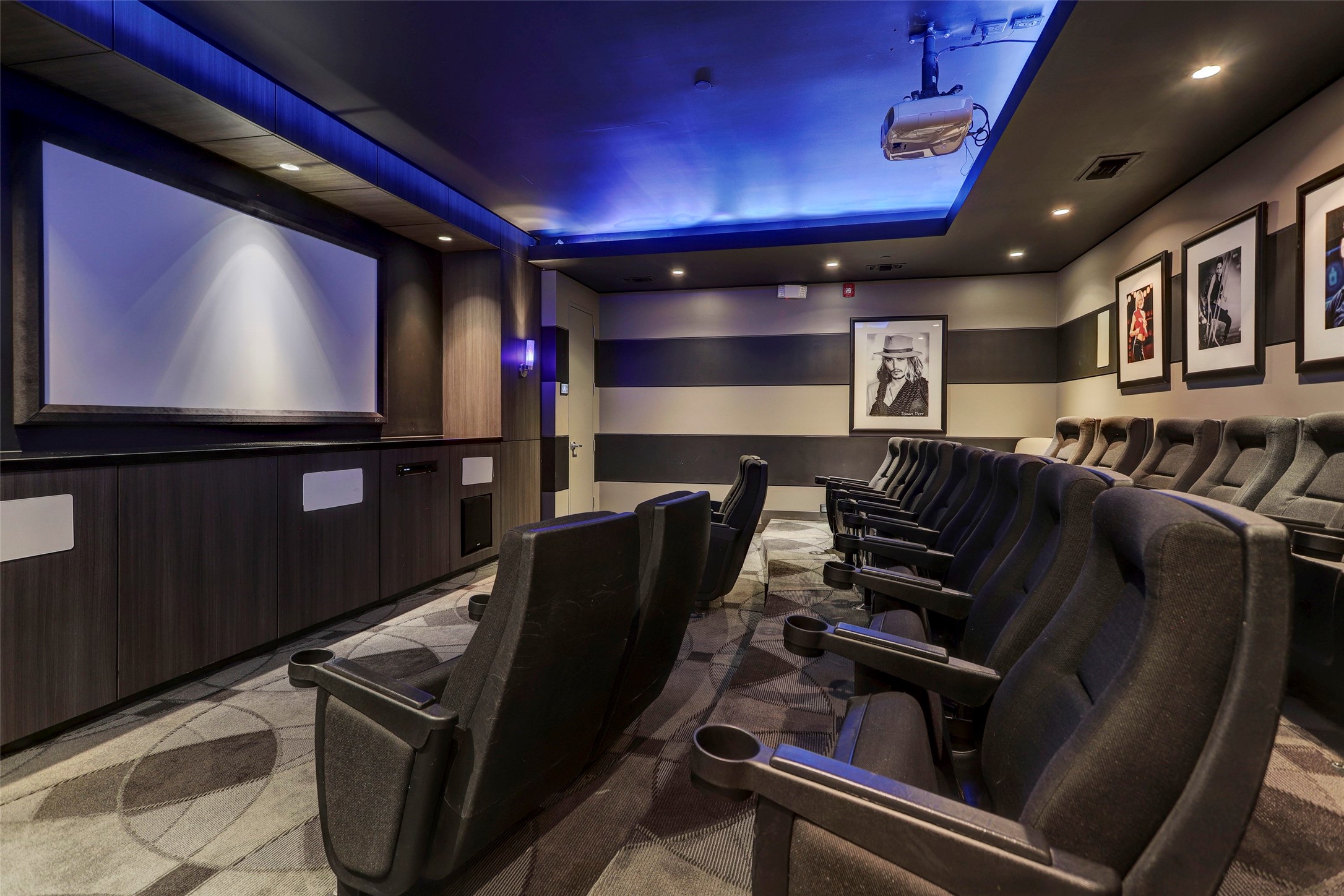 The theater room can hold up to 20 guests. Reserve it to host a movie night or any sporting event.