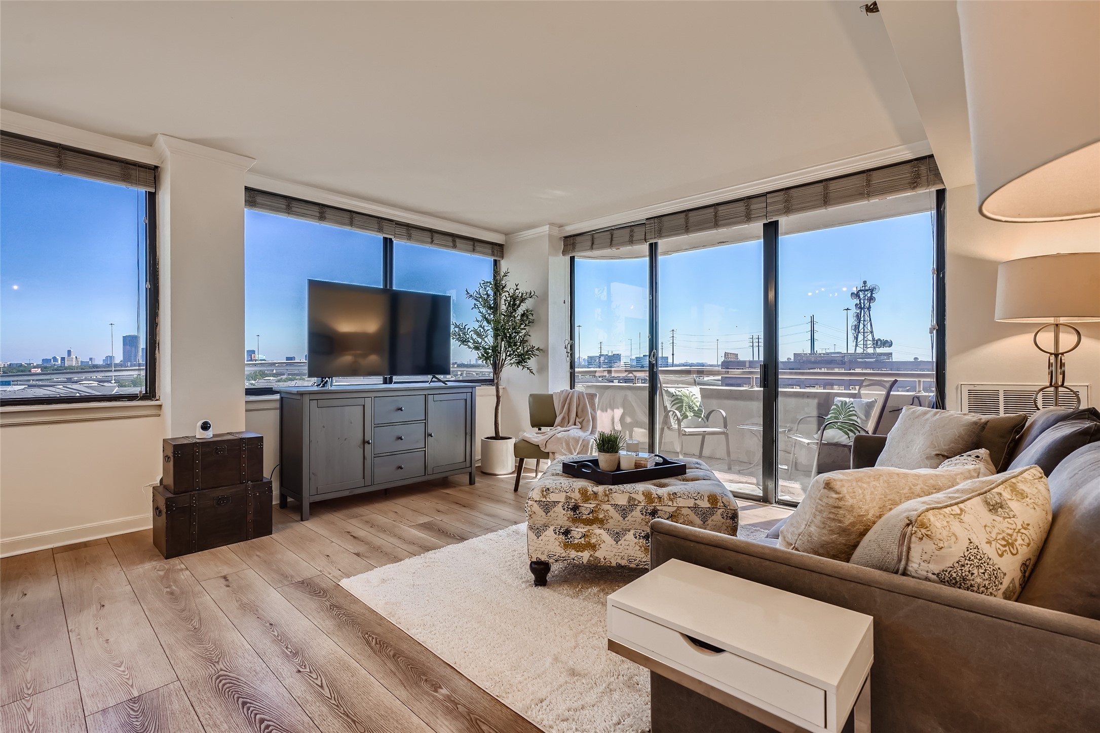 Experience outdoor views from the living room's sliding glass doors that open to the balcony.