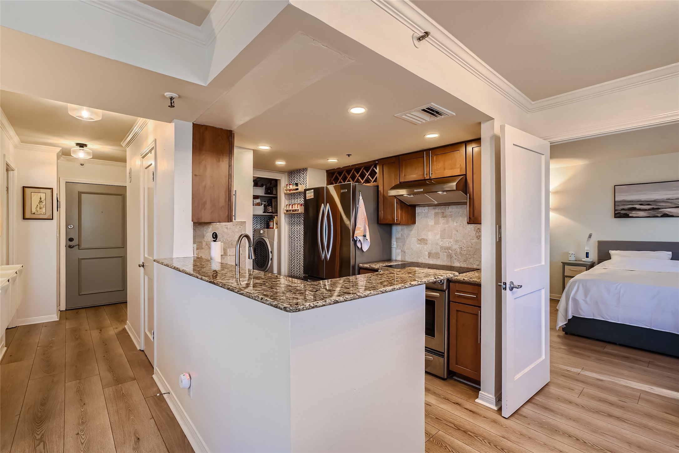 This charming kitchen blends style and functionality and includes stainless steel appliances.