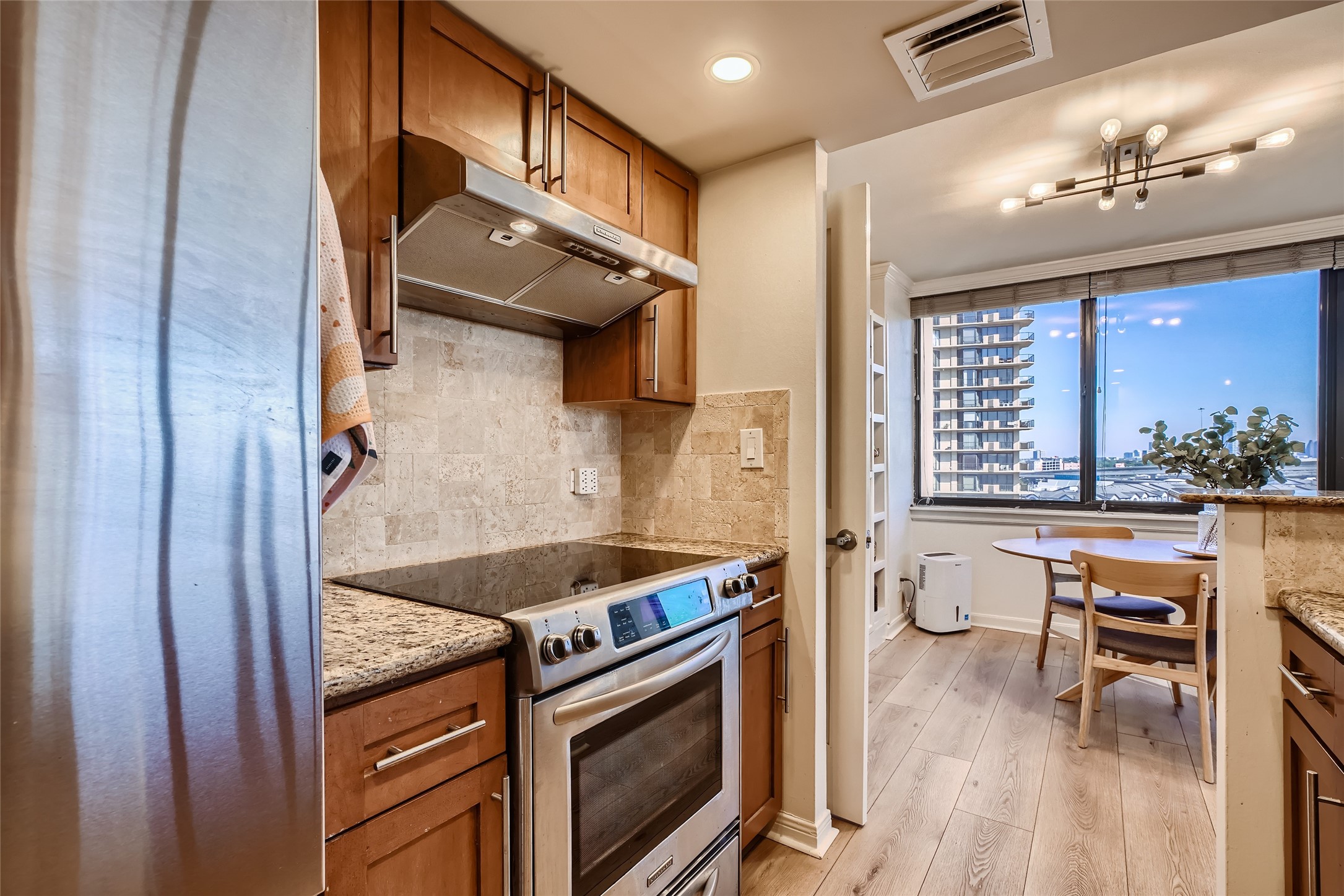 Take in another perspective of the kitchen with an east-facing view.