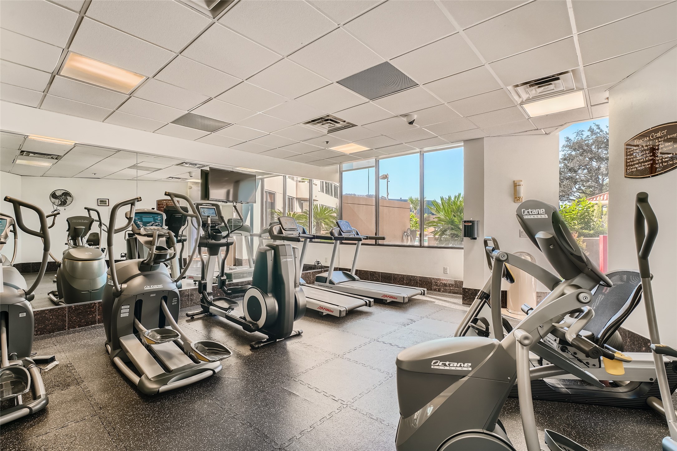 Elevate your fitness routine with the convenience of an on-site gym. There is a separate area with weights.