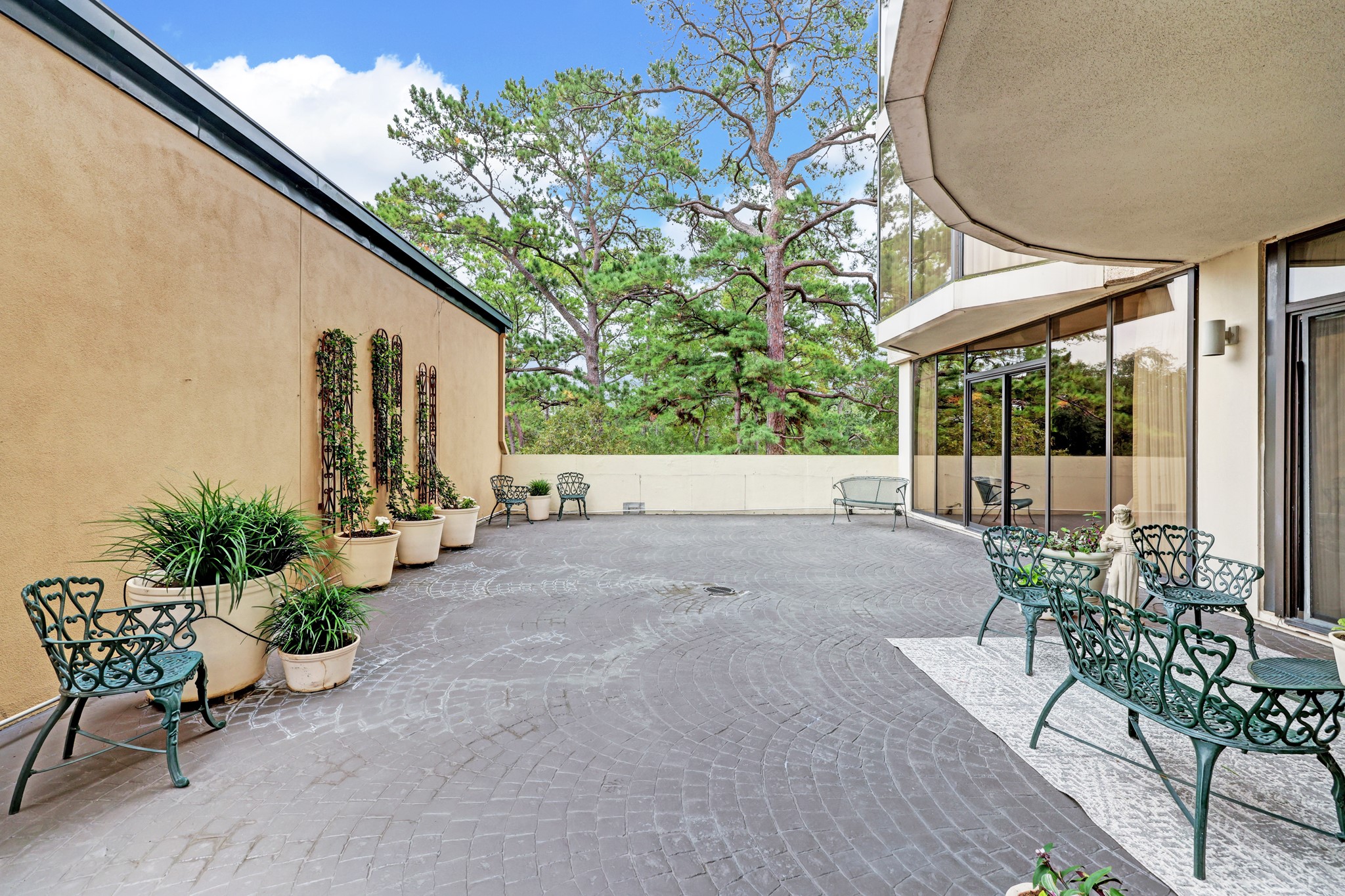 Outdoor patio area offers plenty of space to garden an enjoy the outdoors on peaceful patio.