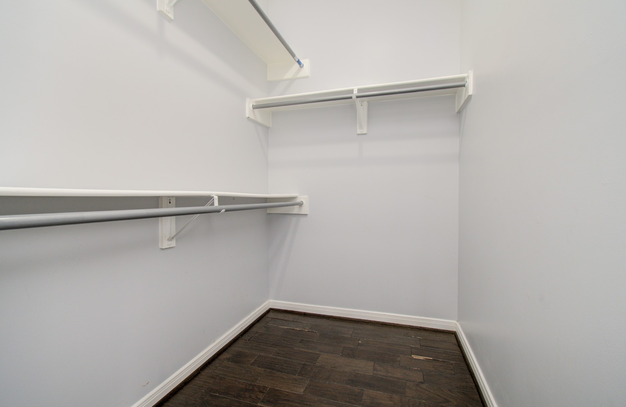 One of two walk-in closets in the guest house bedroom.