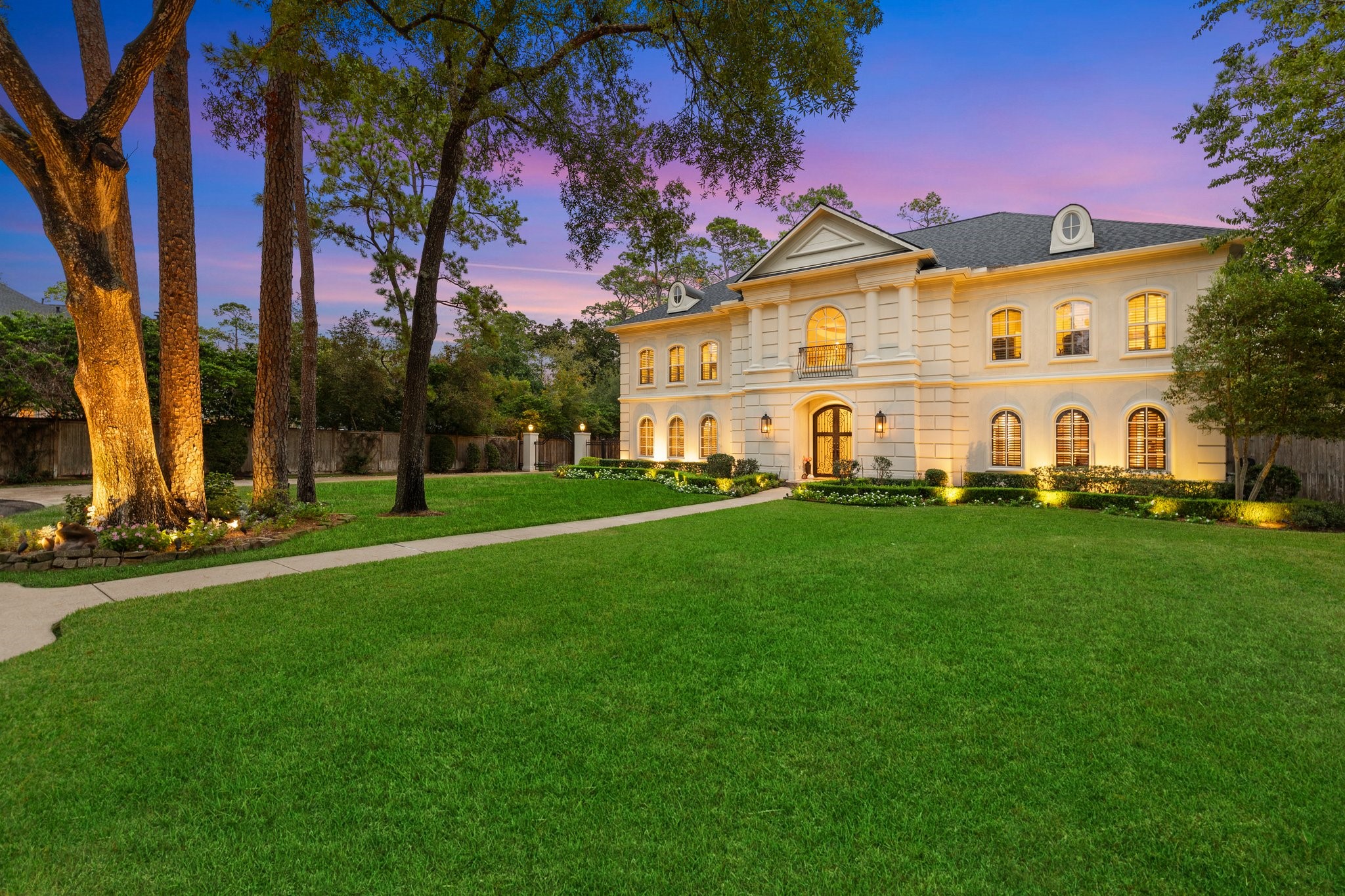 This stunning estate is a masterpiece of luxury and refinement. Nestled on an expansive lot, the property offers and unrivaled blend of seclusion and convenient access to the city's amenities.