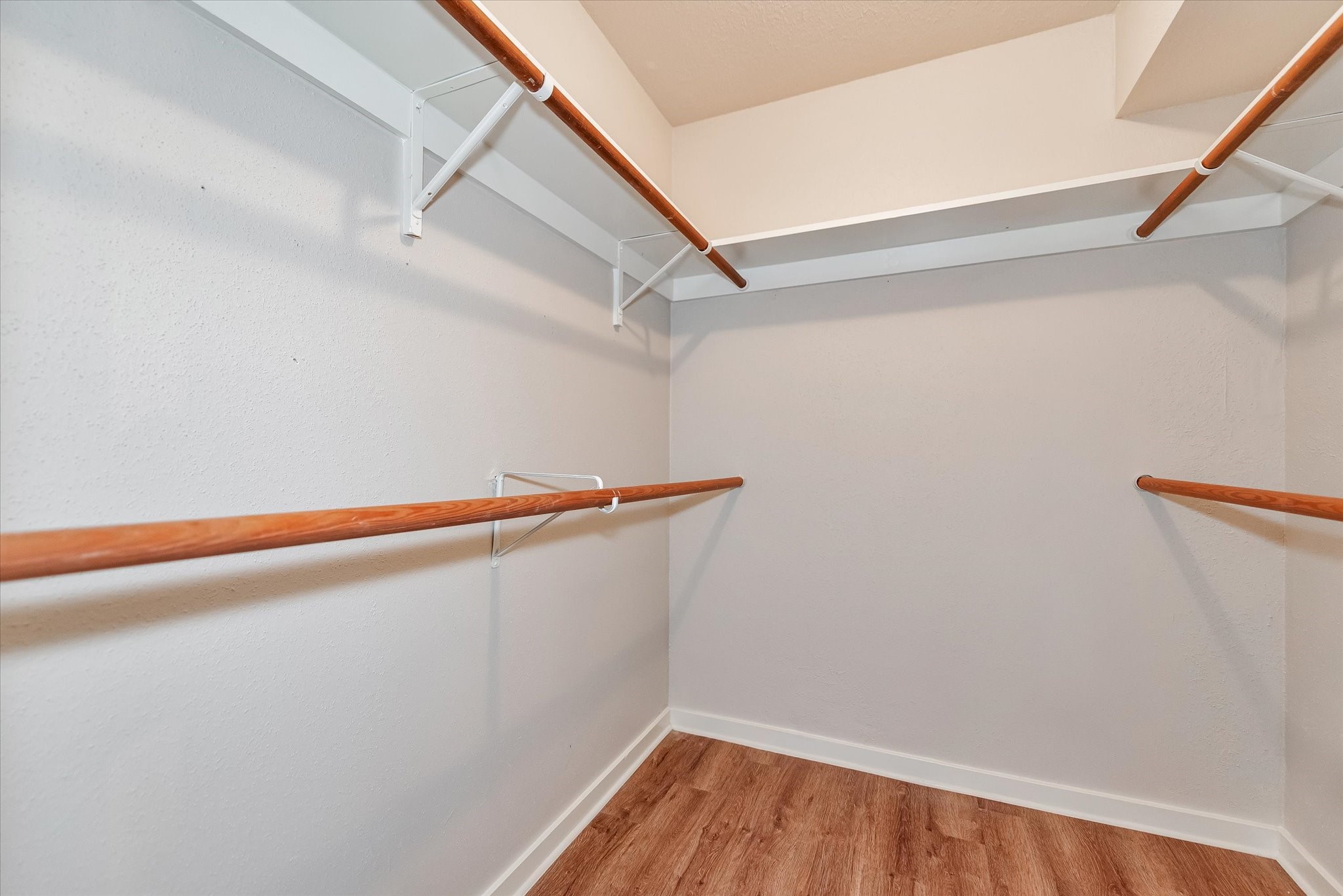 Primary closet, super clean and ready for excellent storage.