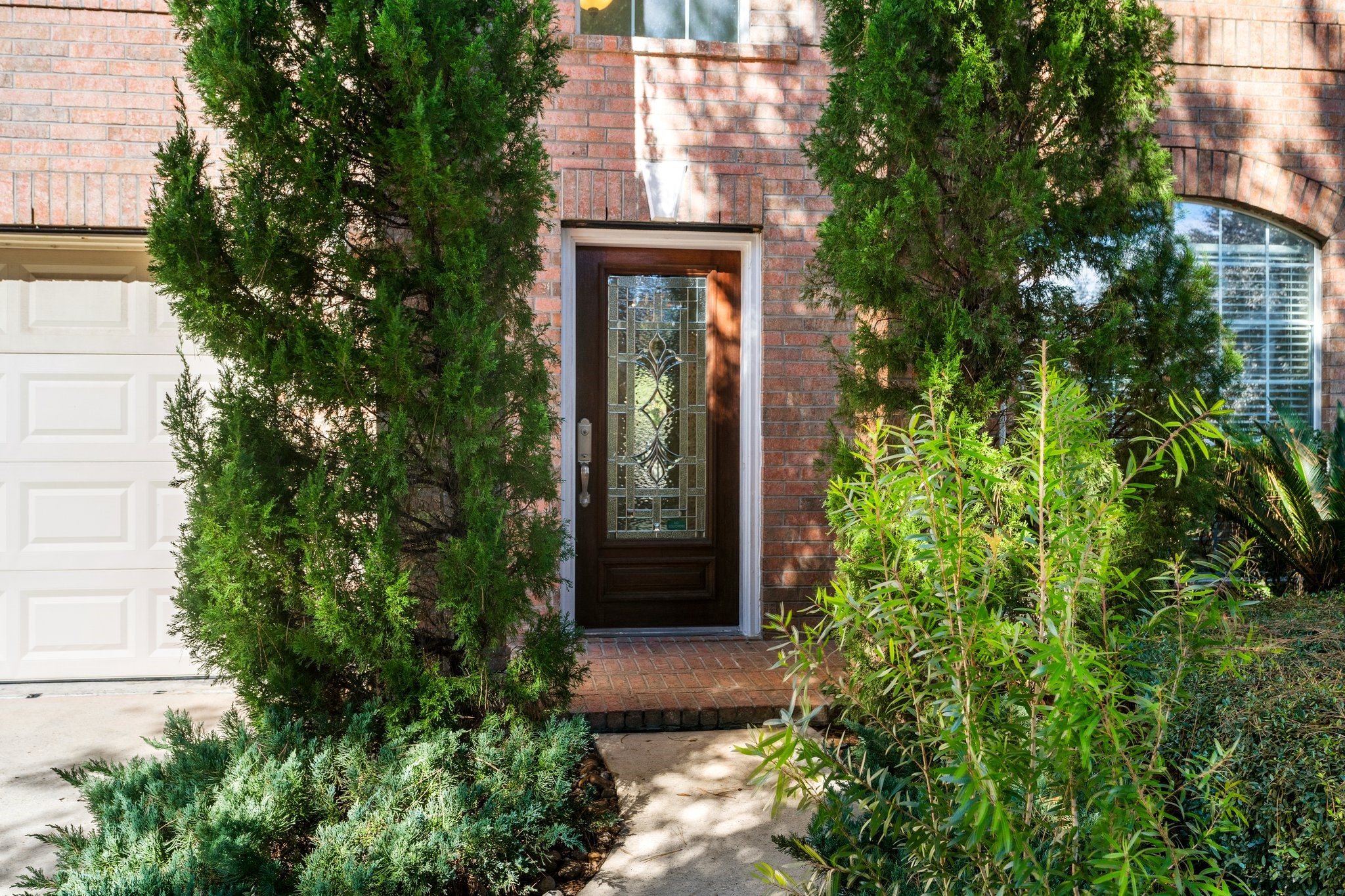 This beautiful leaded glass front door will greet all your guests!