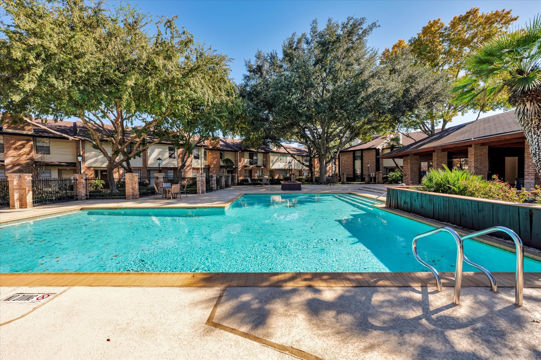 Right across the street you can enjoy a limited access pool, providing a refreshing escape from the Texas heat. Surrounded by a well-maintained deck and plenty of trees, the pool area is a private oasis for relaxation and recreation.