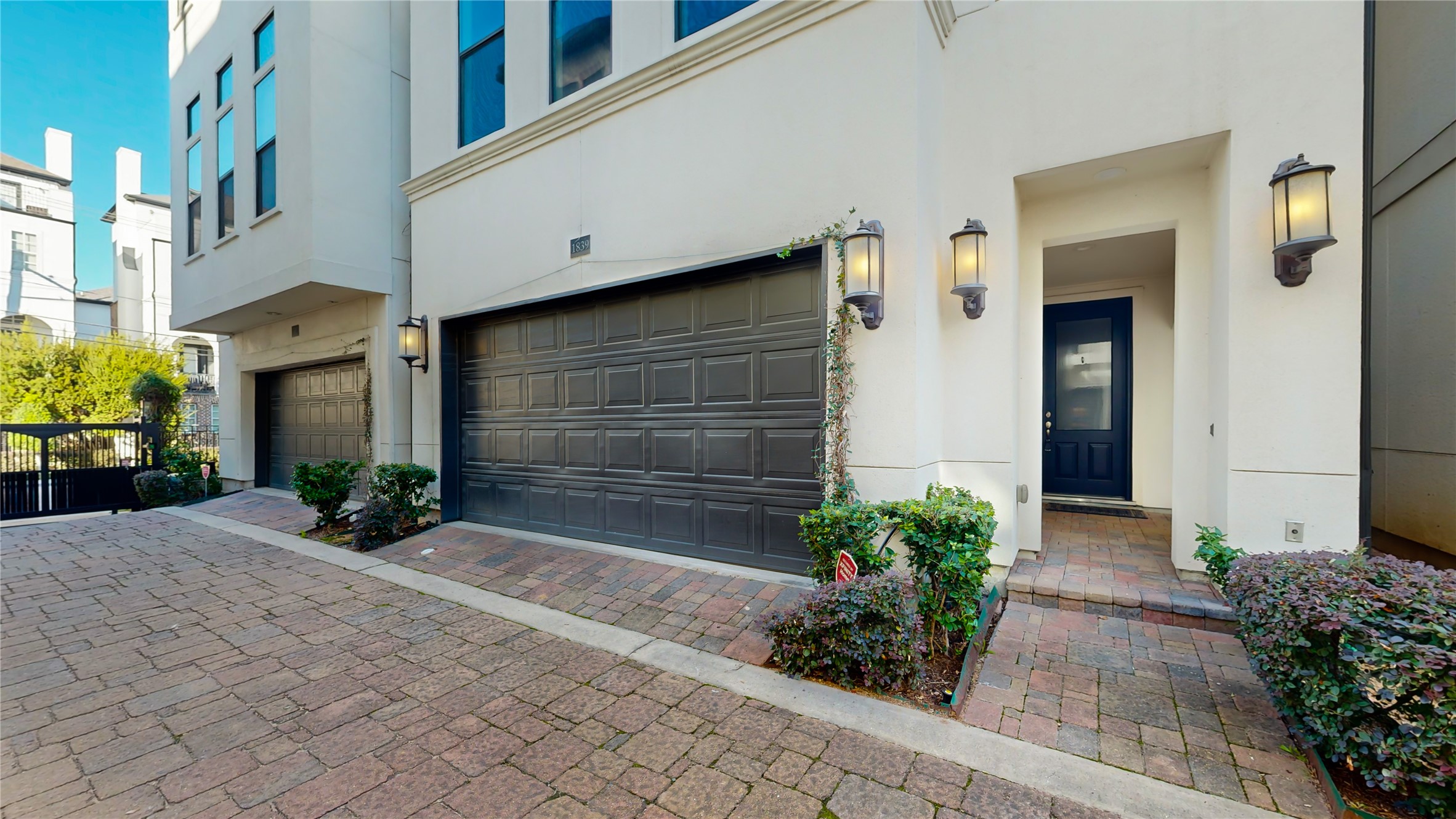 Enter through the electric gate into the beautiful stone driveway to your private garage.