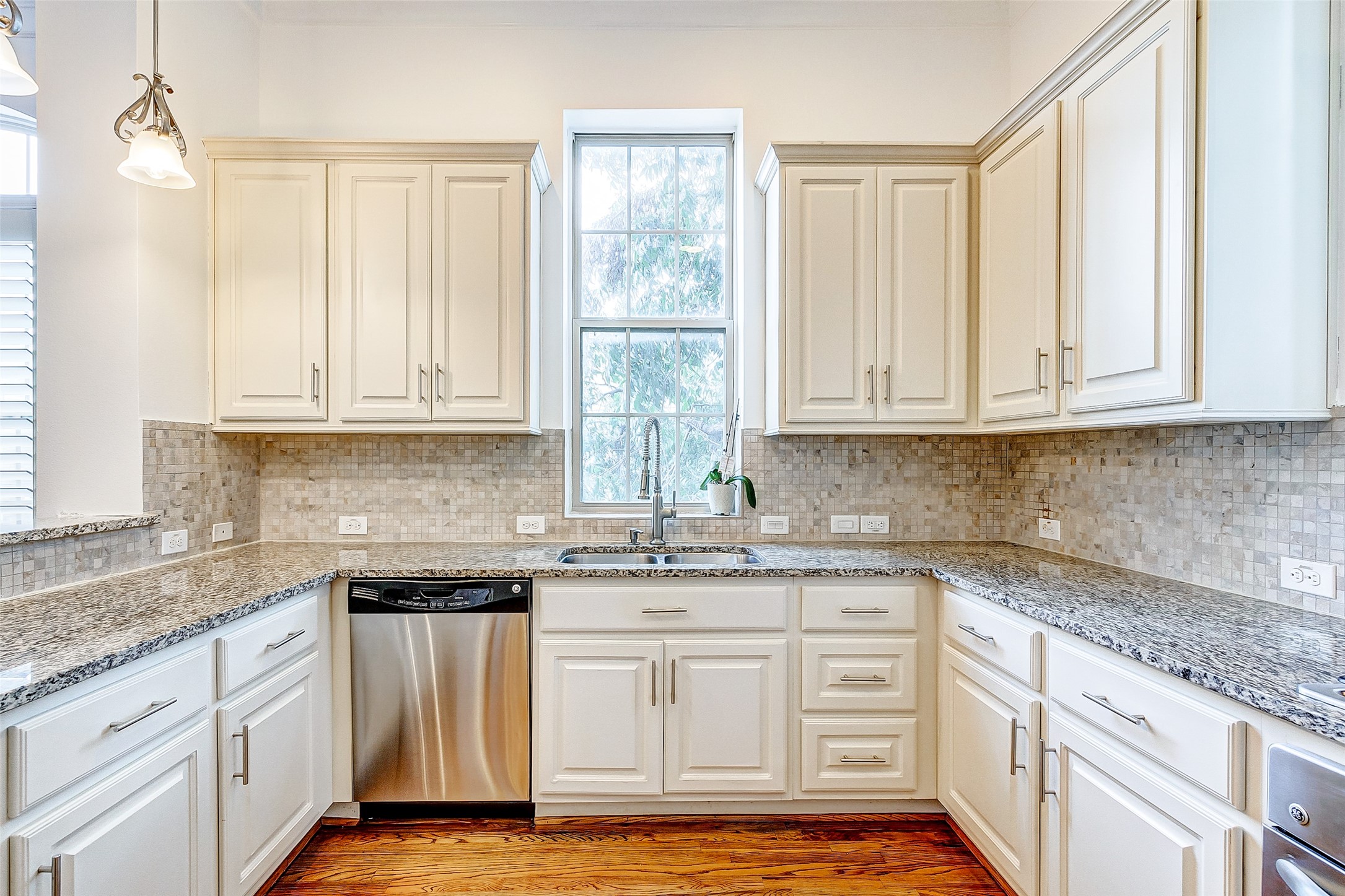 Your new kitchen offers plenty of counter space for preparing family meals.