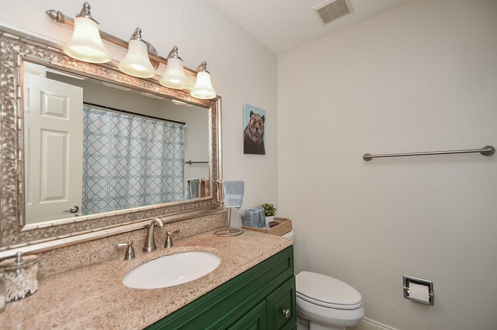 Full bathroom upstairs has an updated vanity with storage and tub/shower combo!