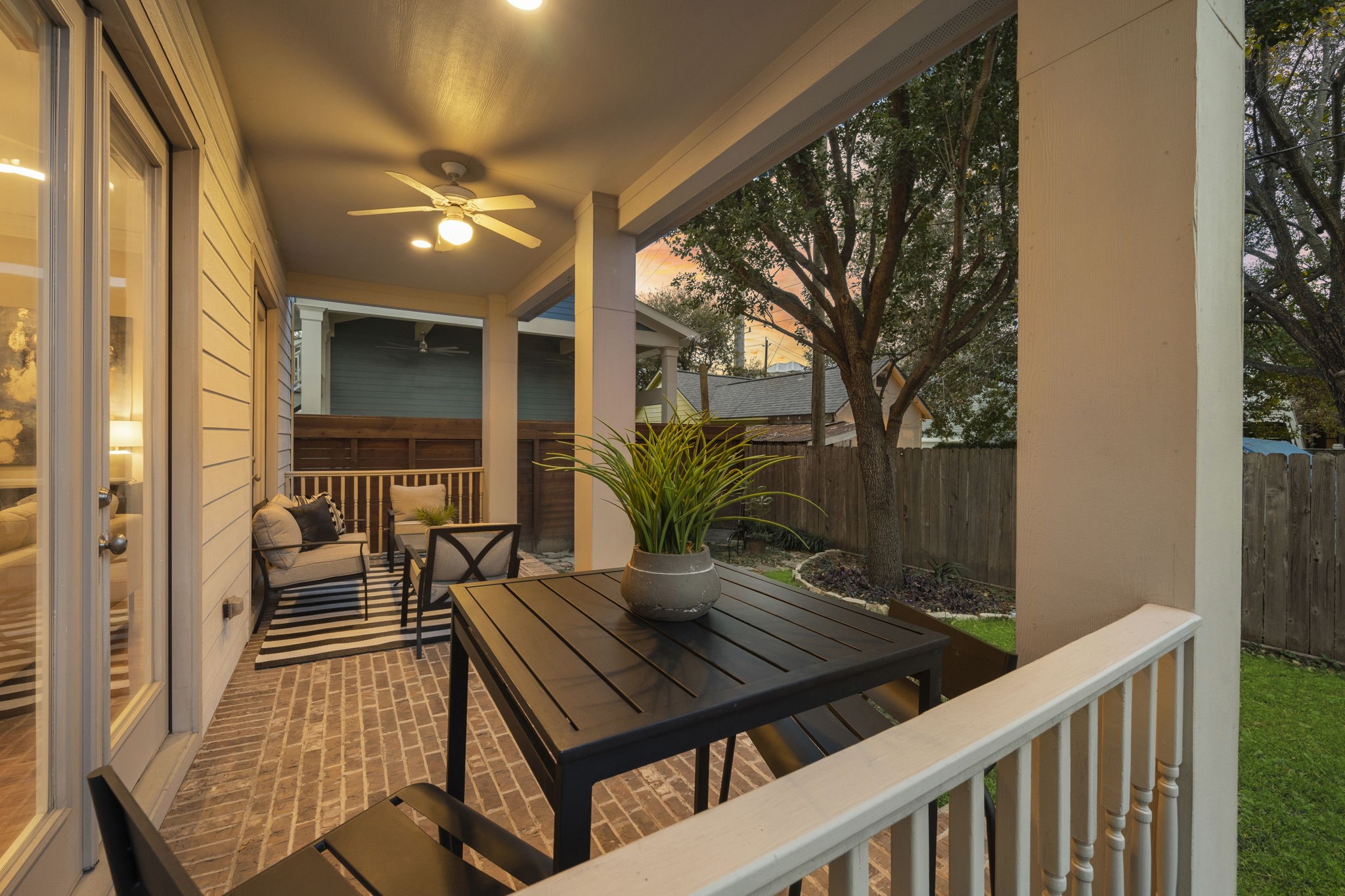 Right off the living area, the private backyard offers abundant space for outdoor seating and plenty of room for your very own garden.