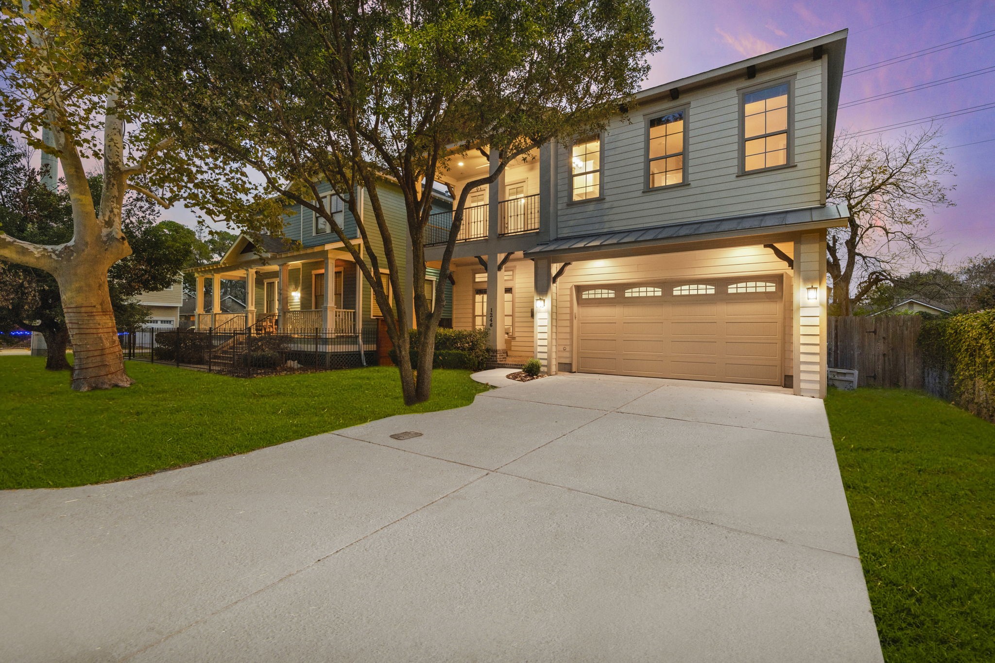 Find abundant parking space courtesy of the double-wide driveway and two-car garage, complete with a recently upgraded door spring (2023).