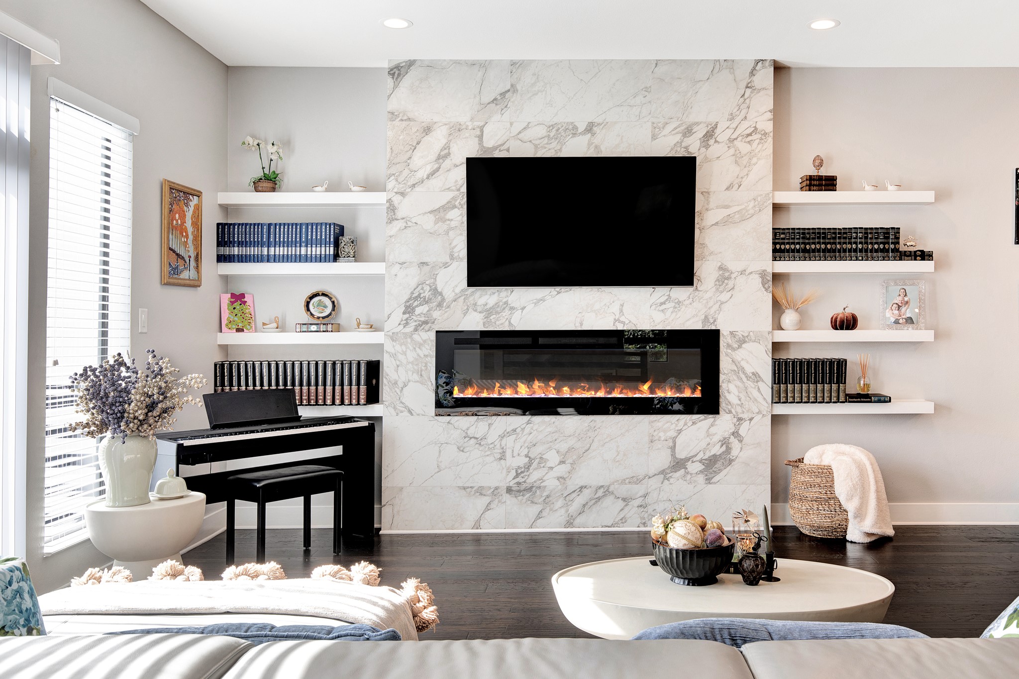 This gorgeous marble fireplace is the focal point of the living room!