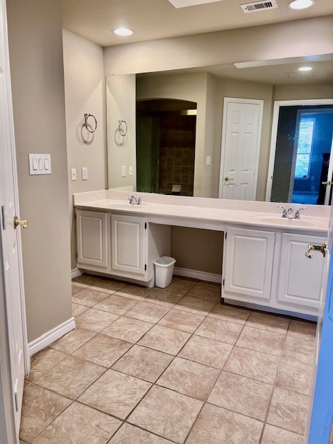 PRIMARY BATH DOUBLE VANITIES AND TUB/SHOWER.