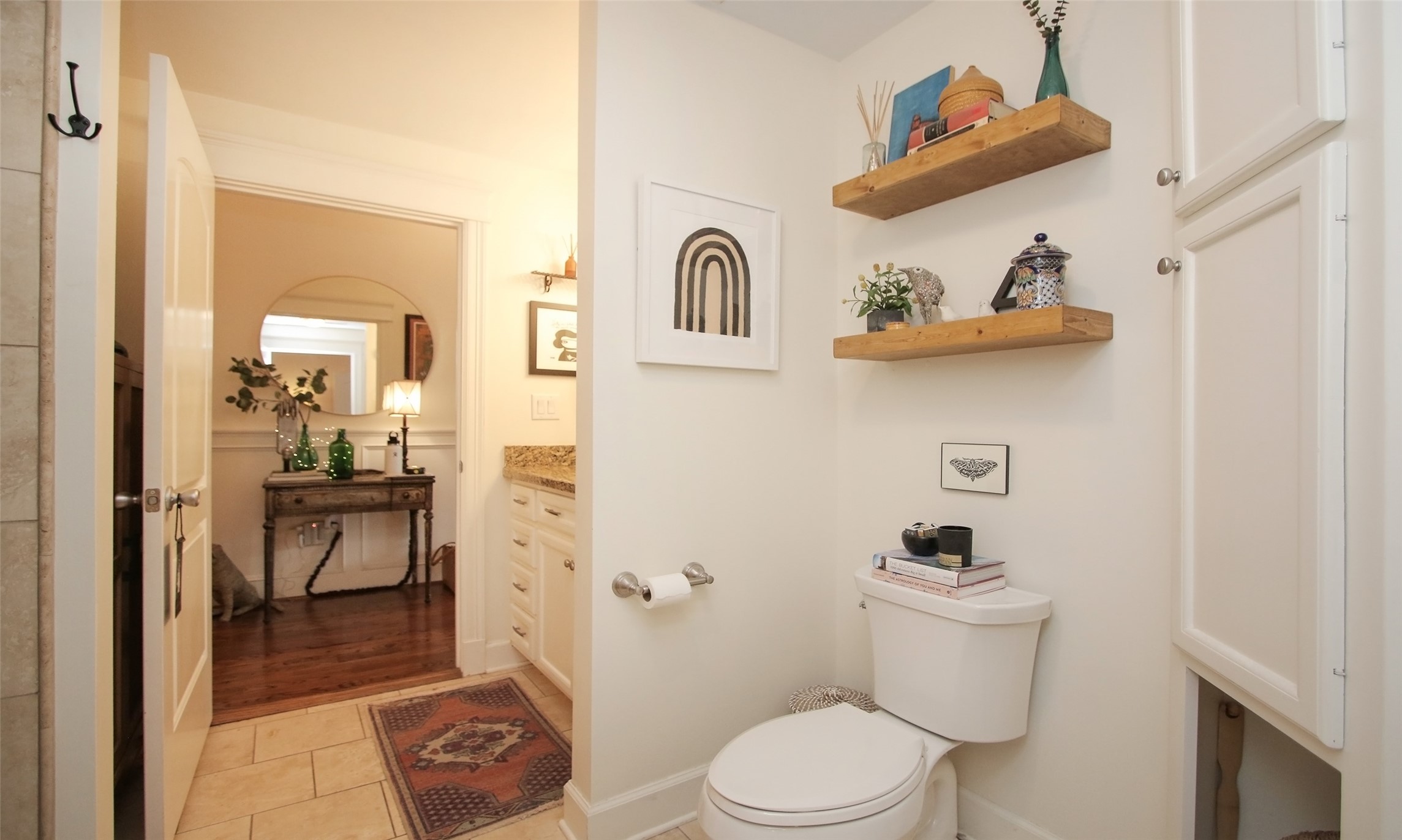 Character galore even in the bathroom with built in corner cabinets and great storage.