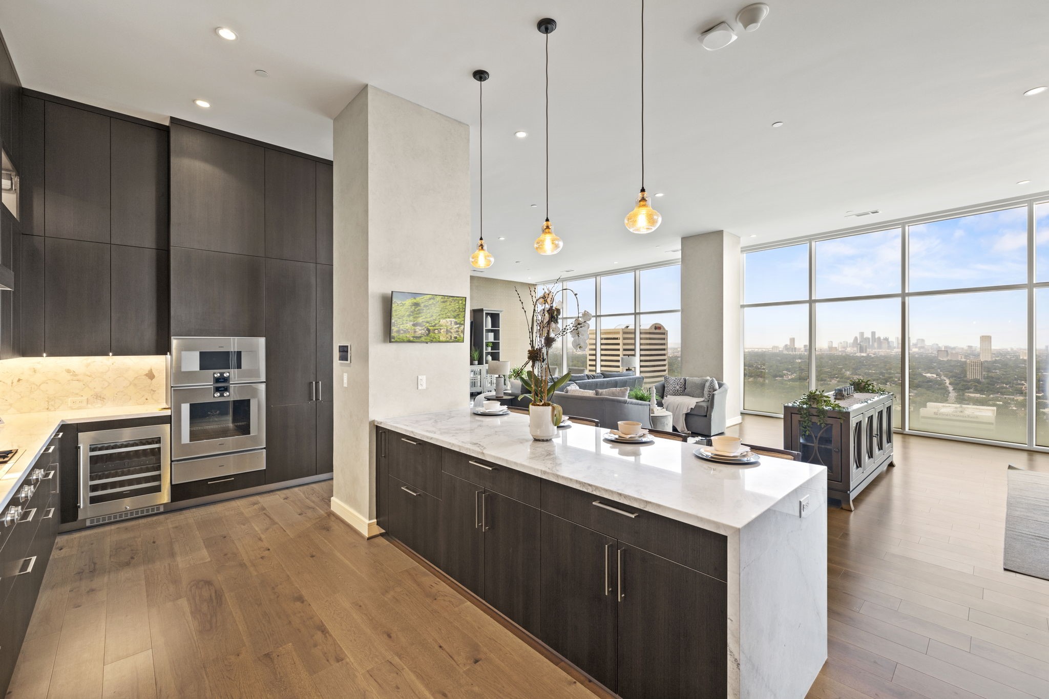 Enjoy cooking and socializing in this contemporary kitchen with a welcoming breakfast bar.