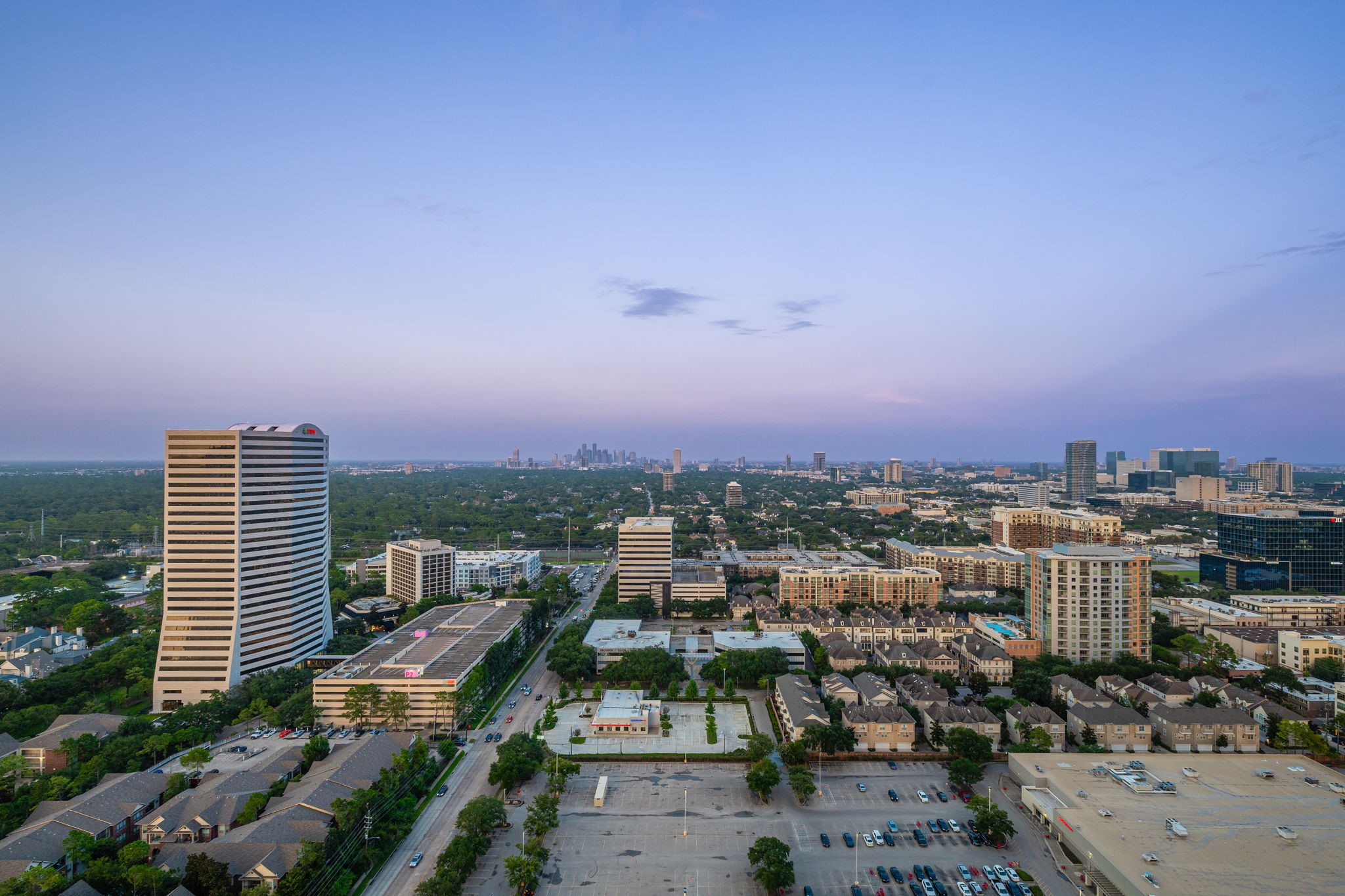 The Houston views stretch far and wide, showcasing the city's bustling streets, cultural districts, and green spaces