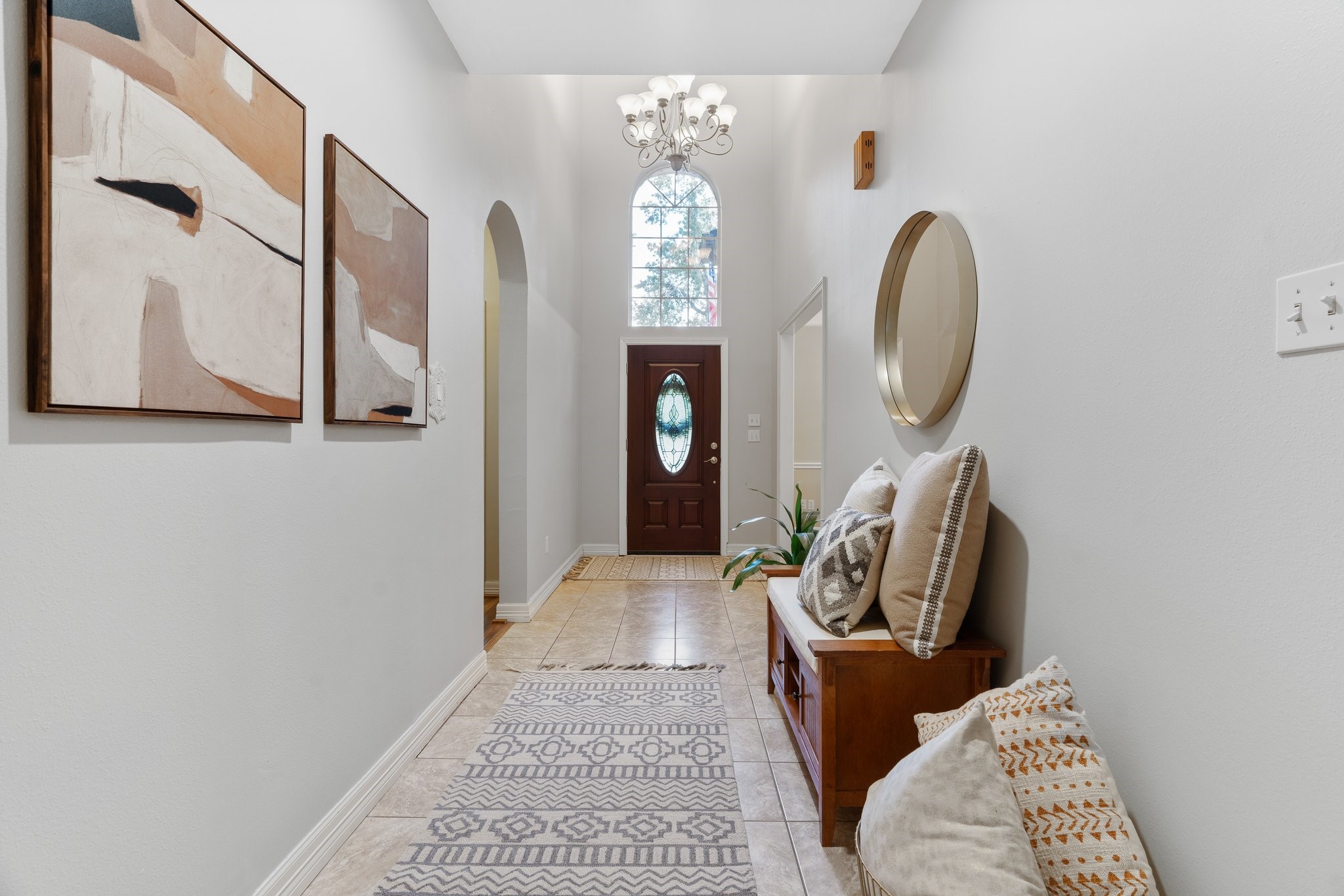 Sunny, inviting entry to the main house sets the tone of this charming home