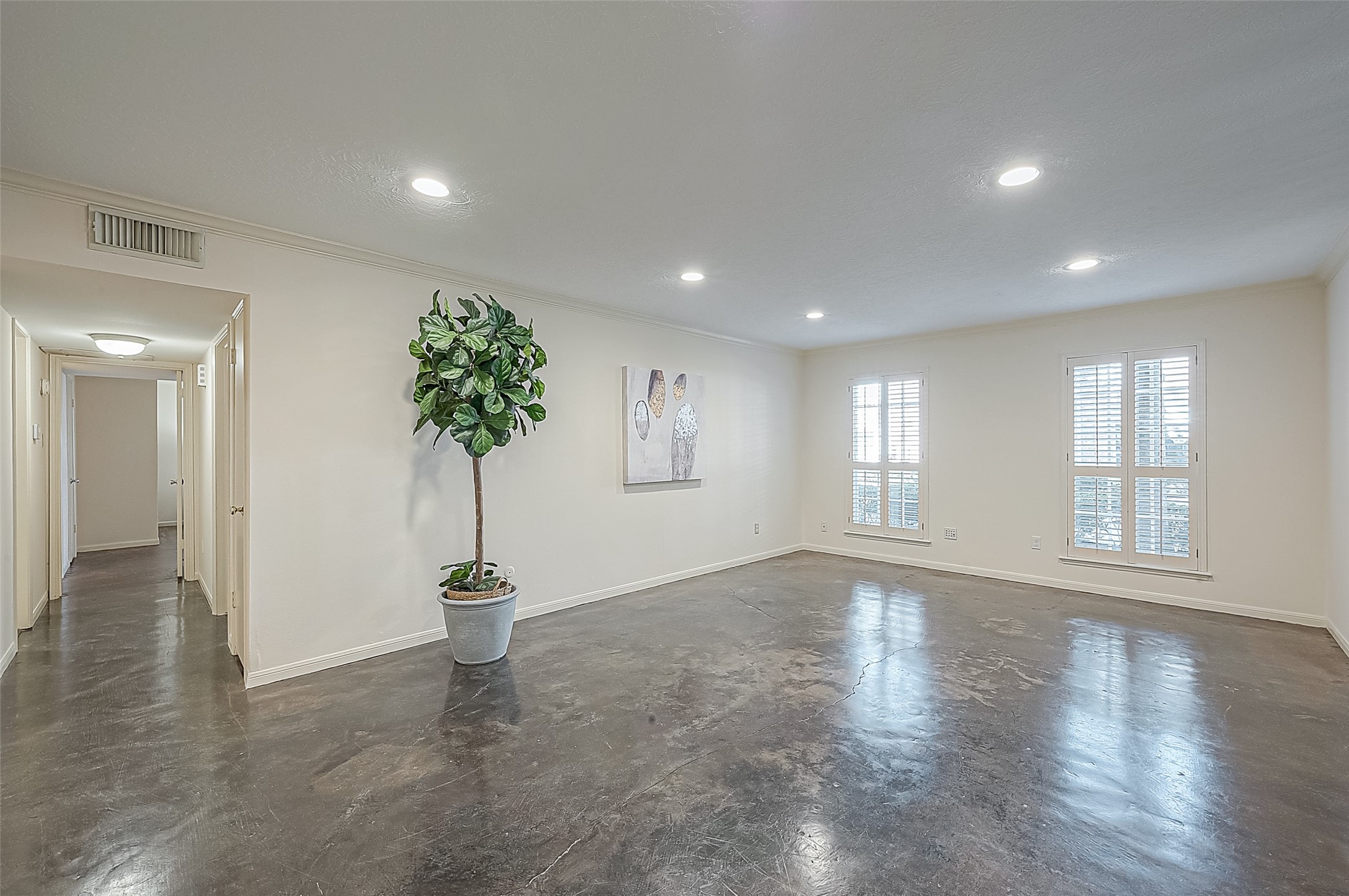Beautiful plantation shutters and low maintenance concrete floors throughout.