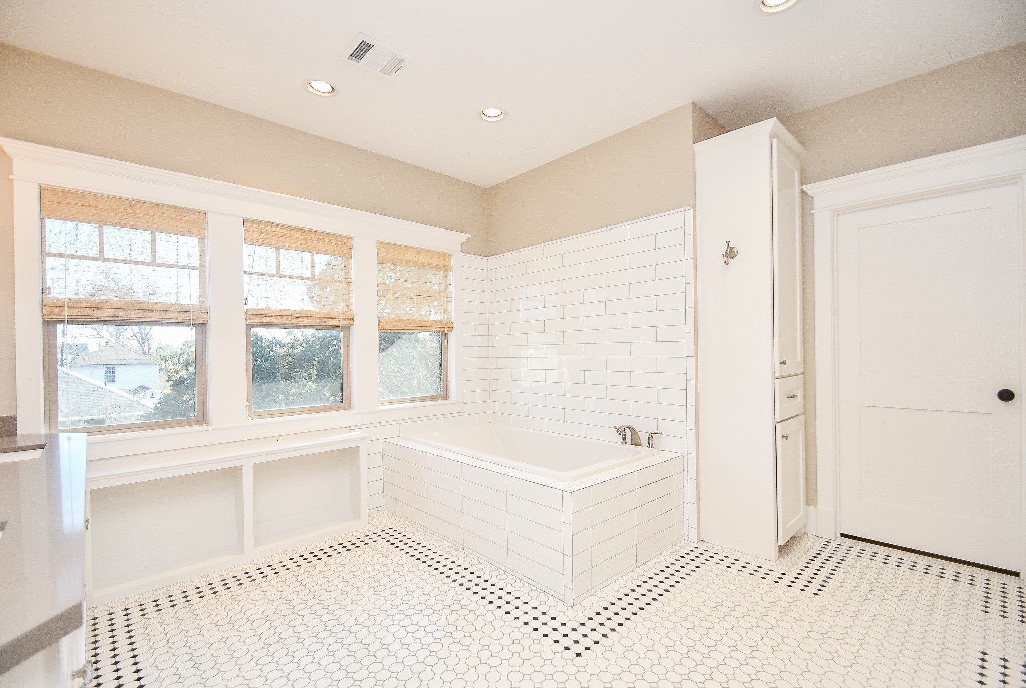 Spacious primary bath with a separate tub.