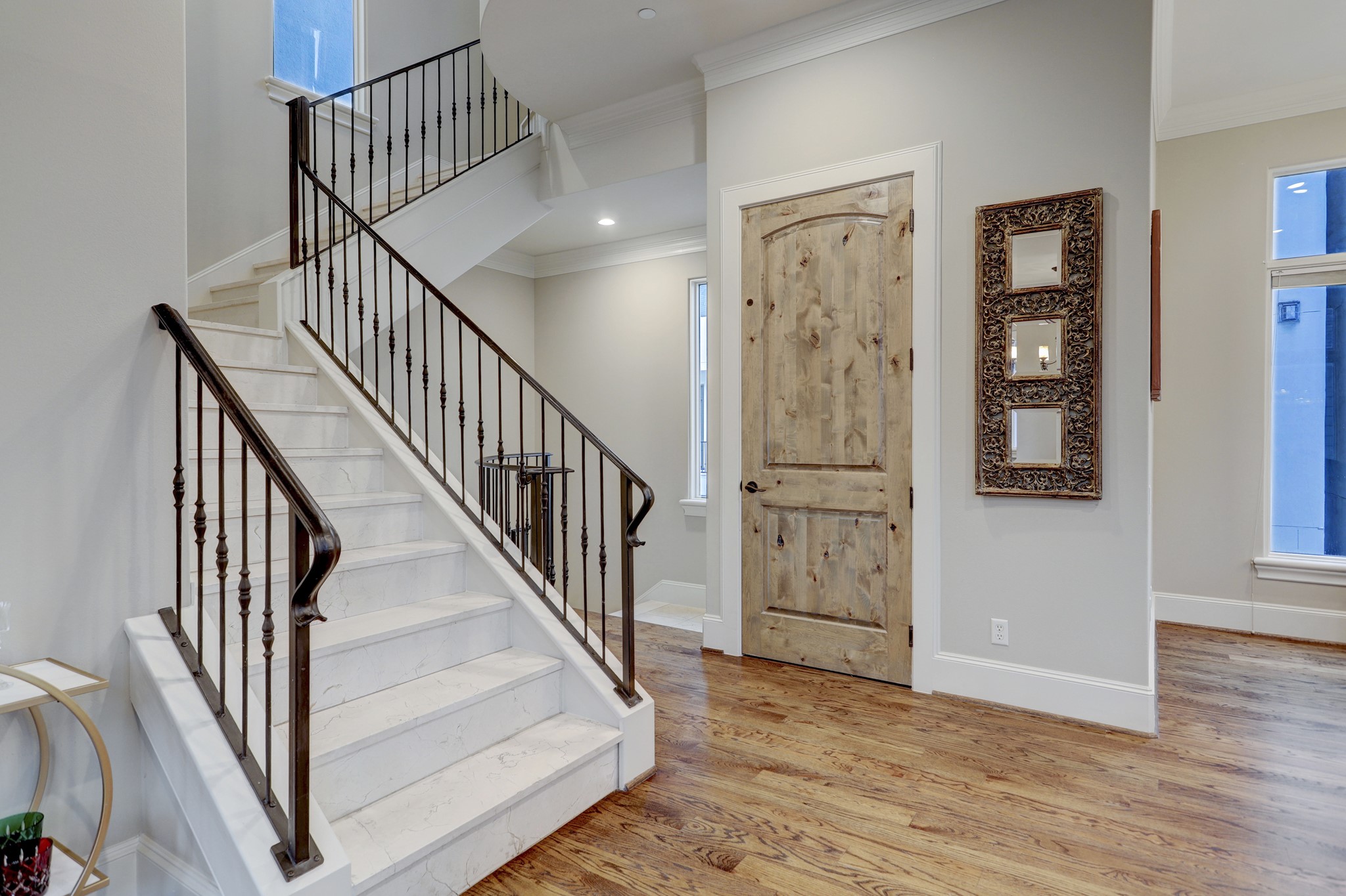 This fabulous stone staircase creates such a sophisticated feel with hard wood floors.
