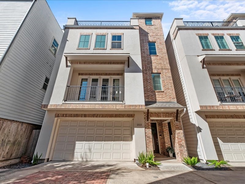 Gorgeous 4-story home nestled in a gated enclave in the desirable Sawyer Heights neighborhood.