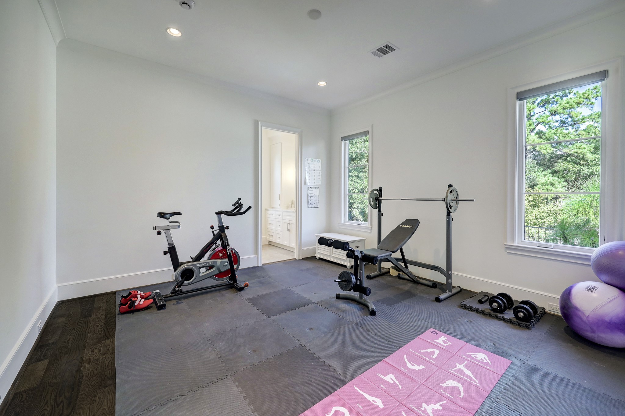 This guest bedroom is currently being used as a gym when guests are not visiting. This
room also offers privacy with its en-suite bath and generous walk-in custom-built closet.