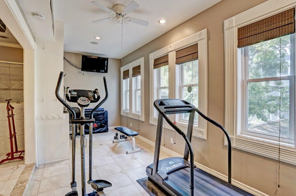THE FITNESS ROOM OFF THE PRIMARY BATH