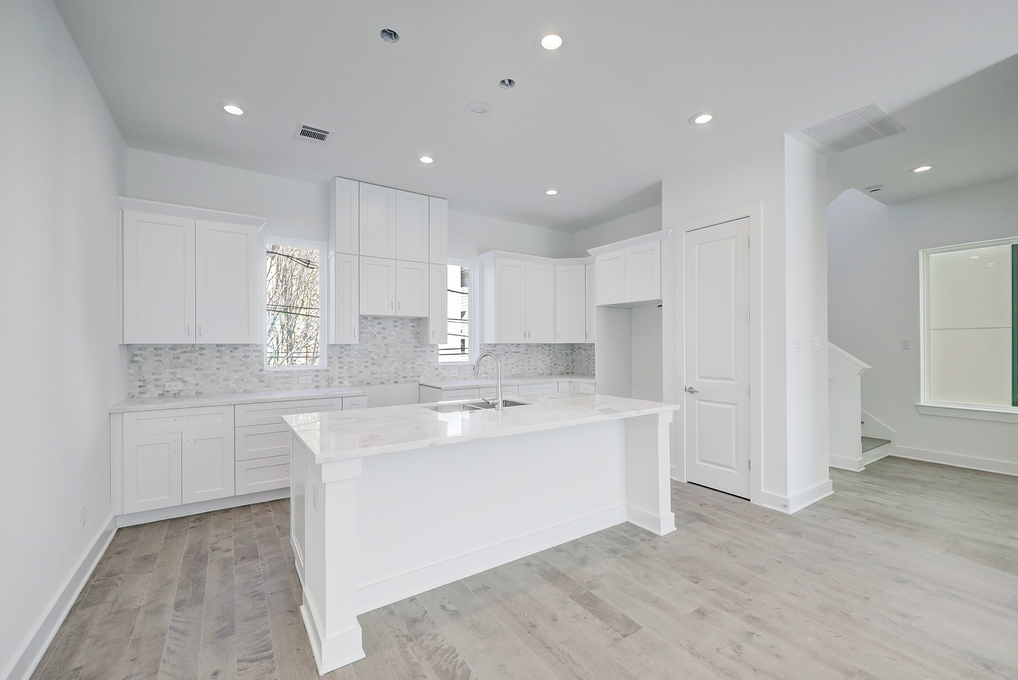 Kitchen with Cabinets to the Ceiling * Recessed Lighting.