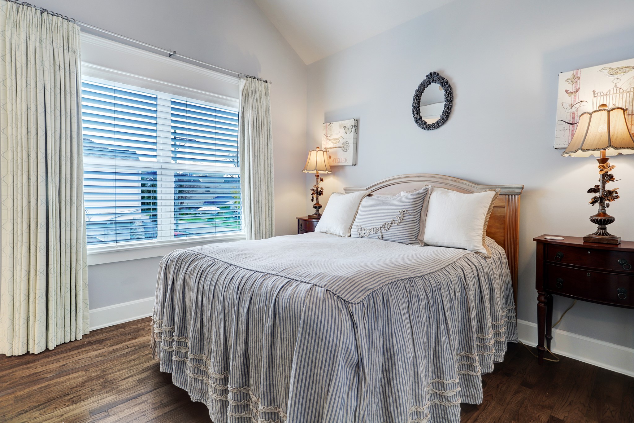 This secondary bedroom features a walk-in closet and en-suite bathroom.