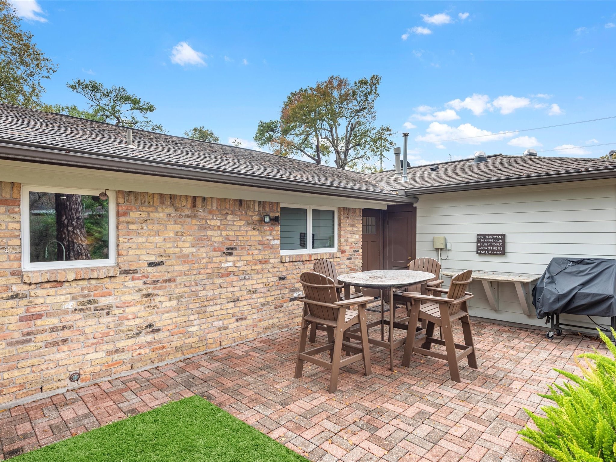 There is also a paved patio in the backyard! A built-in buffet provides counterspace for the grilling enthusiast.