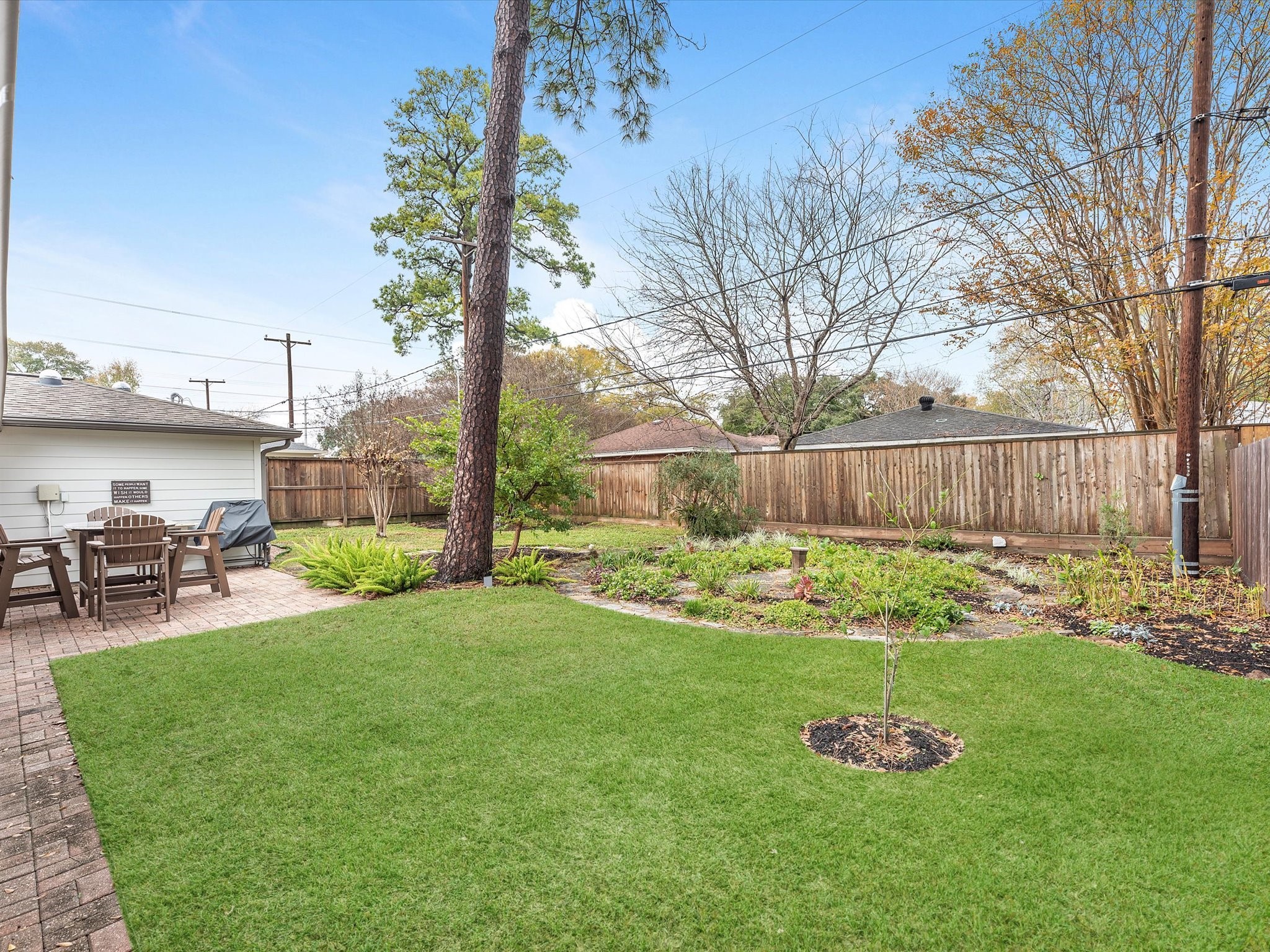 With an 8,775 SF lot there is plenty of backyard! A serene labyrinth walking trail is seen in the background here, with room to spare for a pool, playset, garden, etc!