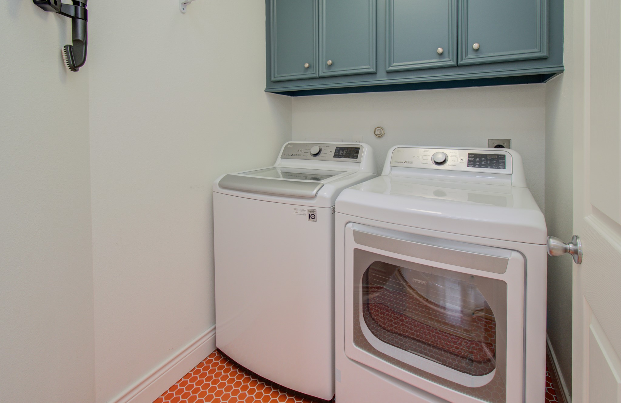 The utility room is conveniently situated on the second floor for easy access and practicality.