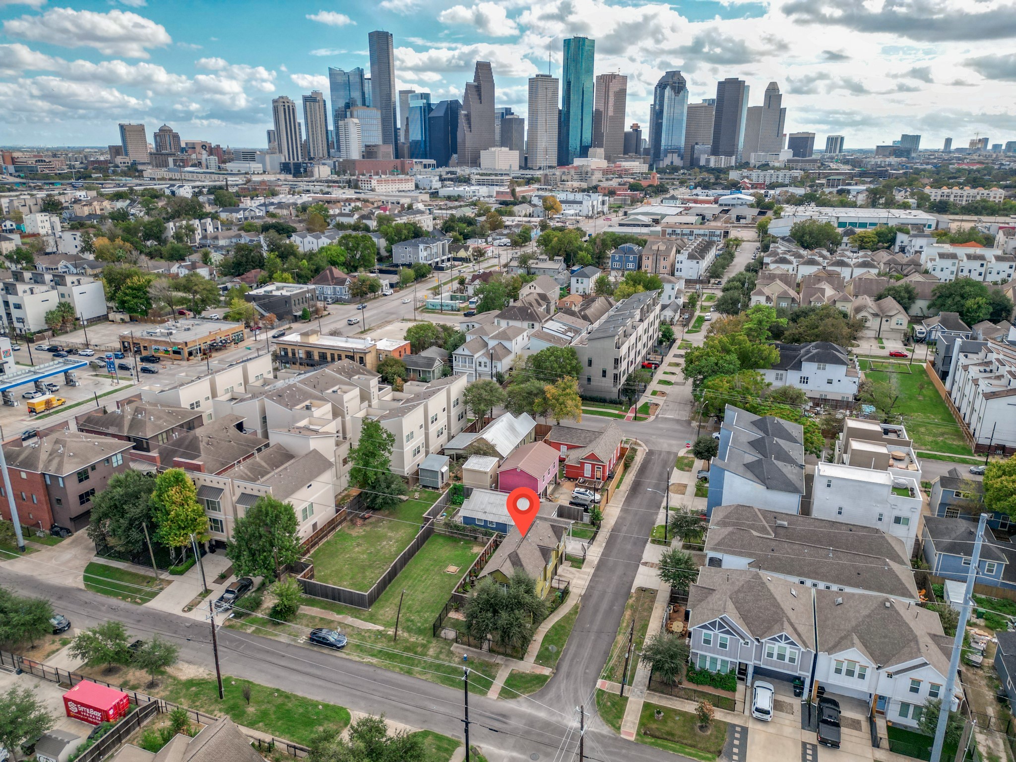 From an aerial perspective, 1521 Shearn's location is notable, with downtown visible in the background and coffee shops and restaurants within walking distance, truly a home that offers it all! Call today to schedule a showing!