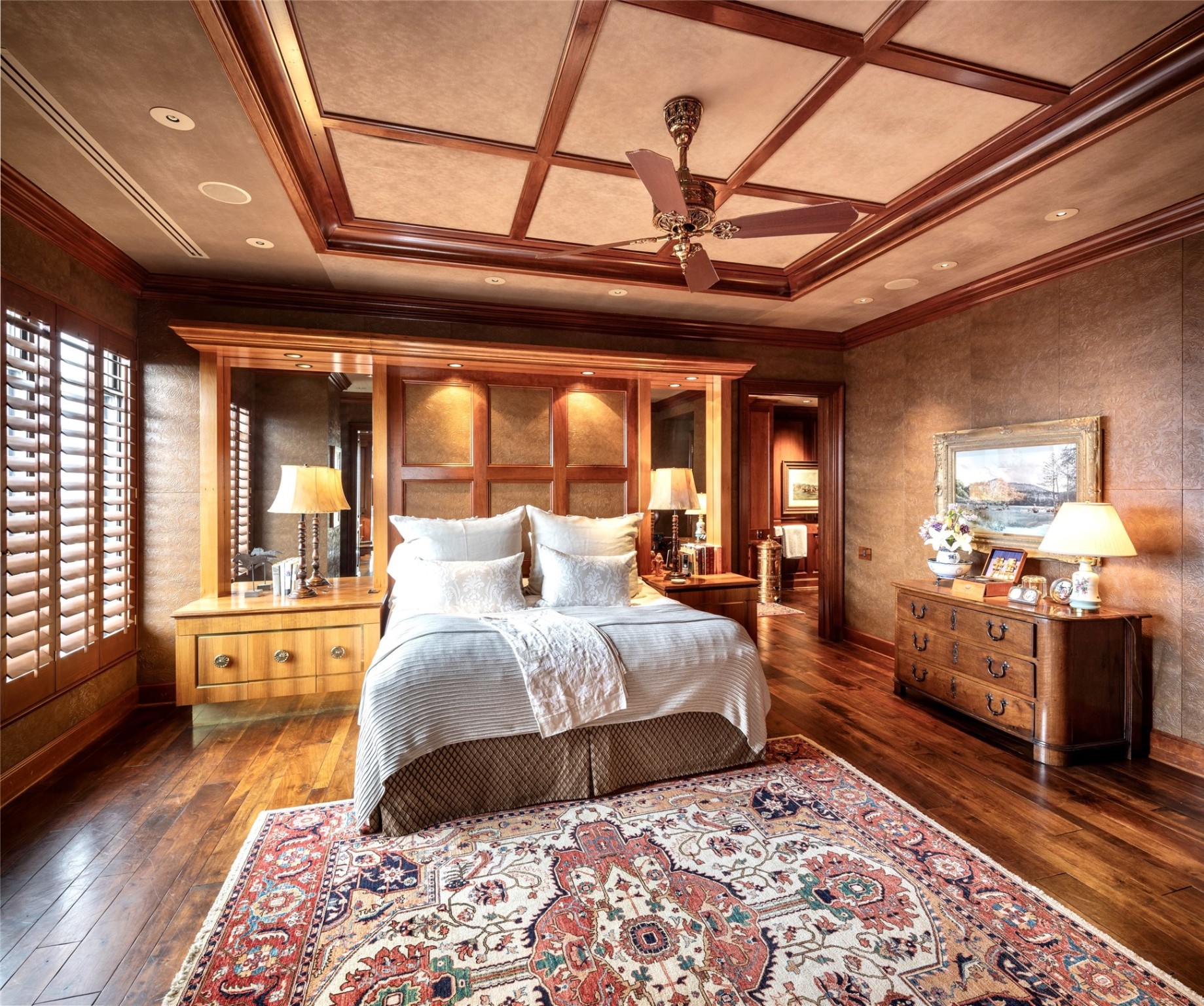 Custom flooring, wood paneling, leather wall treatments, your primary retreat awaits. 