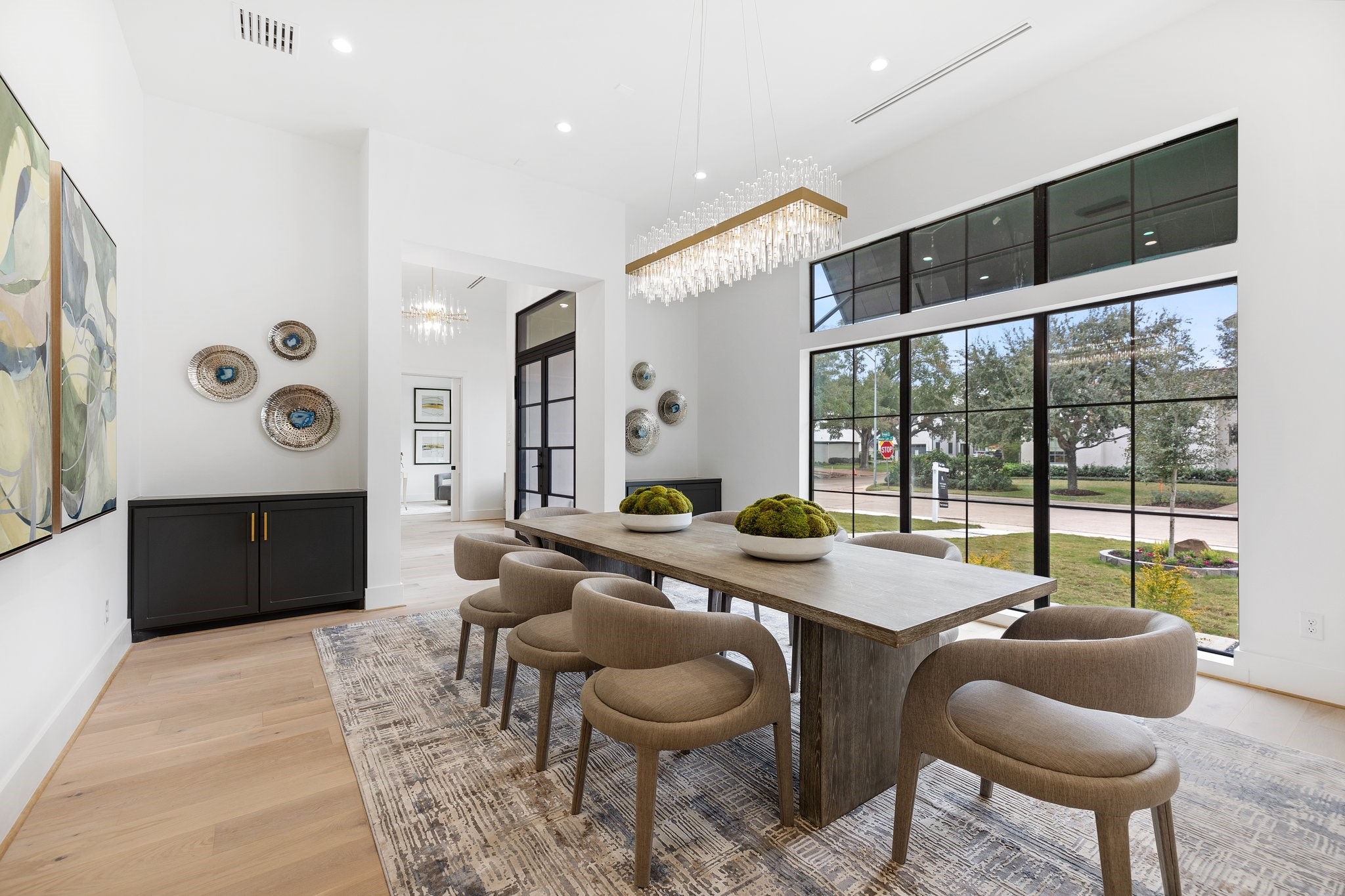 A space designed for creating cherished memories. With a view that welcomes you from the moment you enter, this dining room invites you to gather, share meals, and make lasting memories. It's not just a room; it's a canvas for the stories and moments that transform a house into a home.