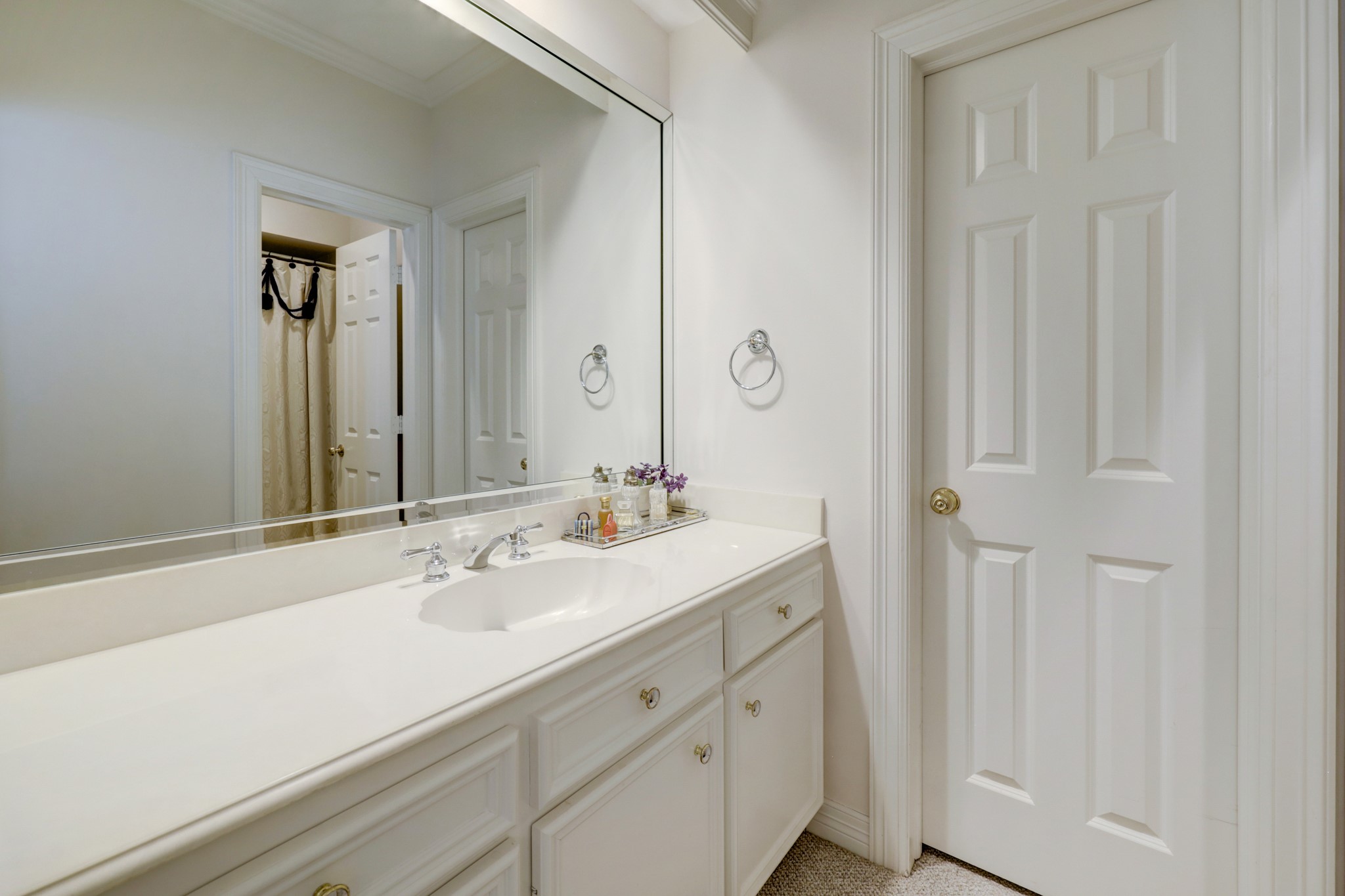 En suite bathroom with shower/tub combo, private water closet and spacious walk-in closet.

