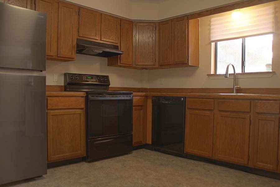 Kitchen in apartment with Stove, refrigerator and dishwasher!