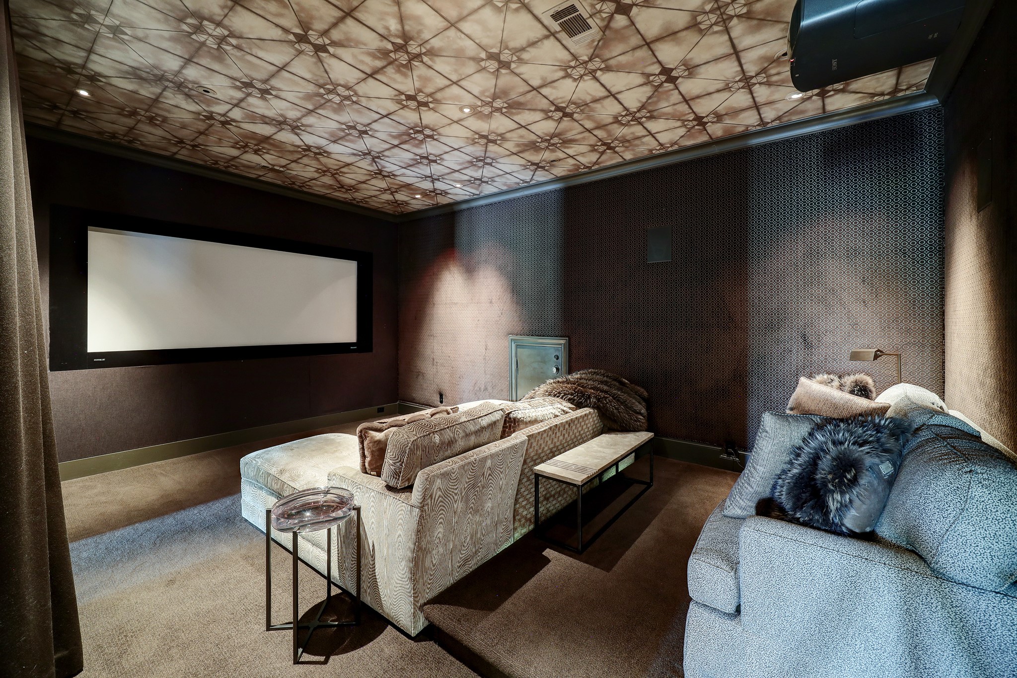 The cinema is artfully designed for entertainment and relaxation and is acoustically optimized for an enhanced experience.
