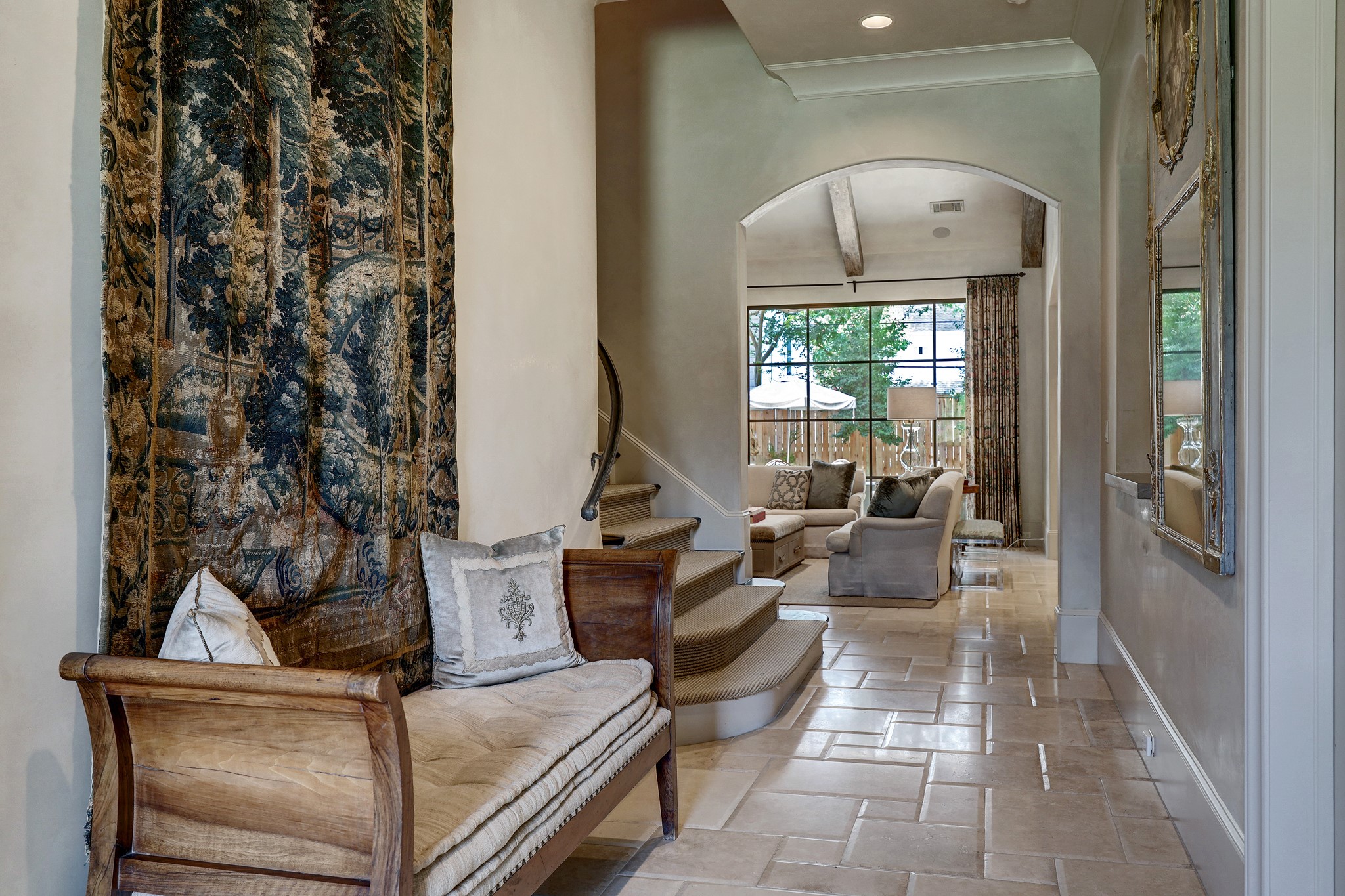The luxurious pillow-edge travertine floors and stunning Segreto plaster walls promise a home filled with elegance, history, and unparalleled design.