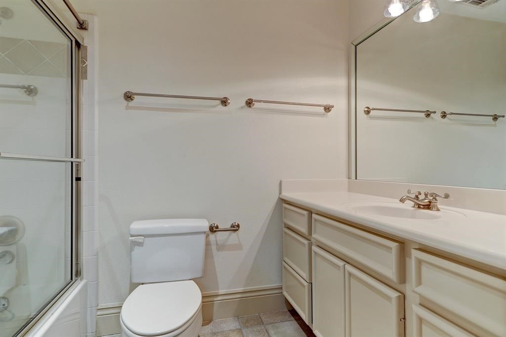 This full bathroom with shower/tub combo is located on the third floor next to two secondary bedrooms.
