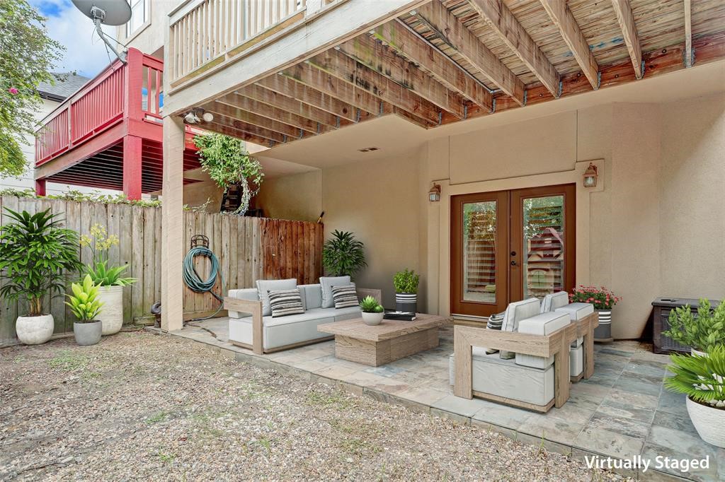 Come outside and enjoy your covered patio and fully fenced yard.