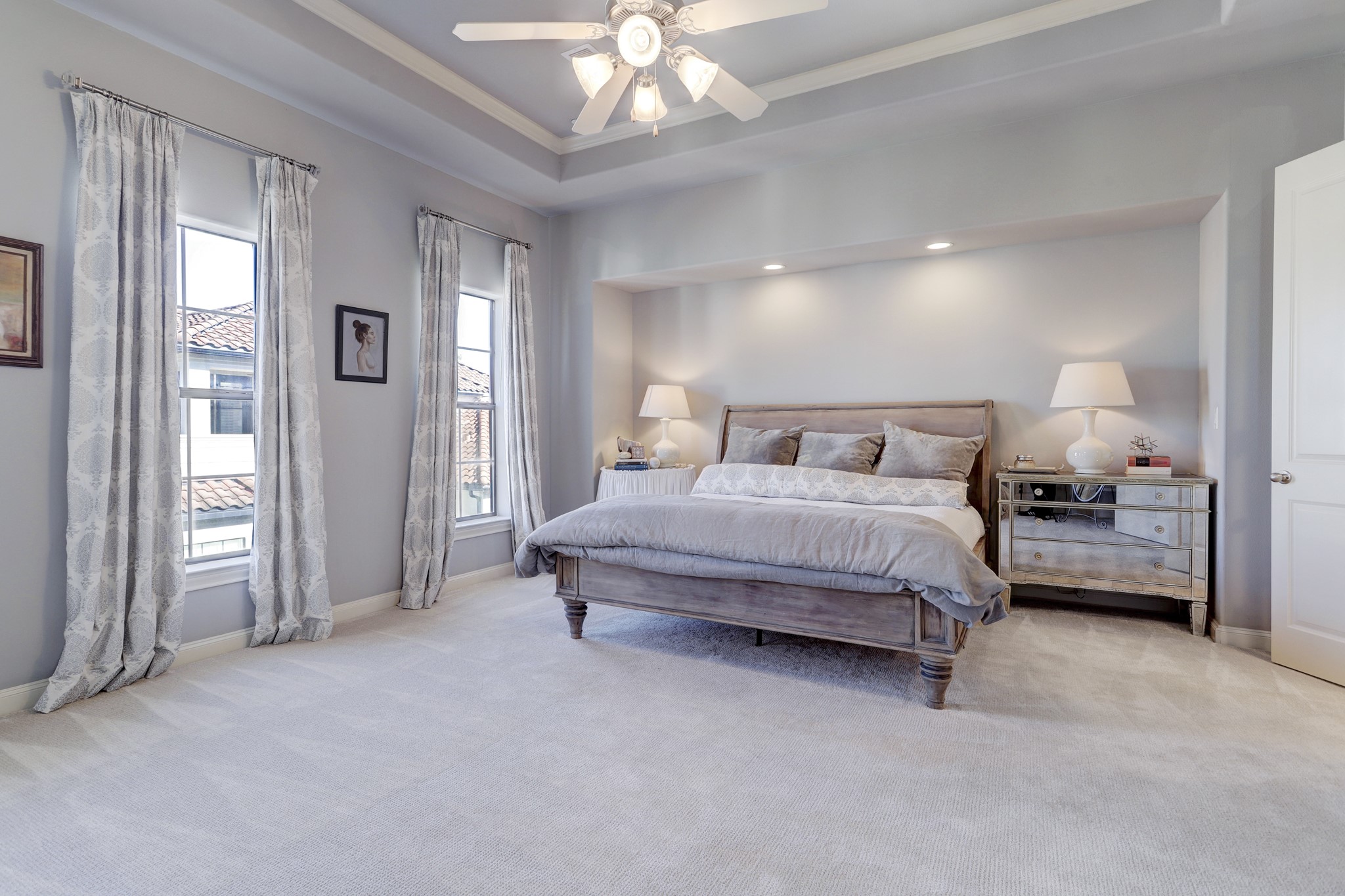 Neutral wall color and carpet selection creates a tranquil feel throughout.