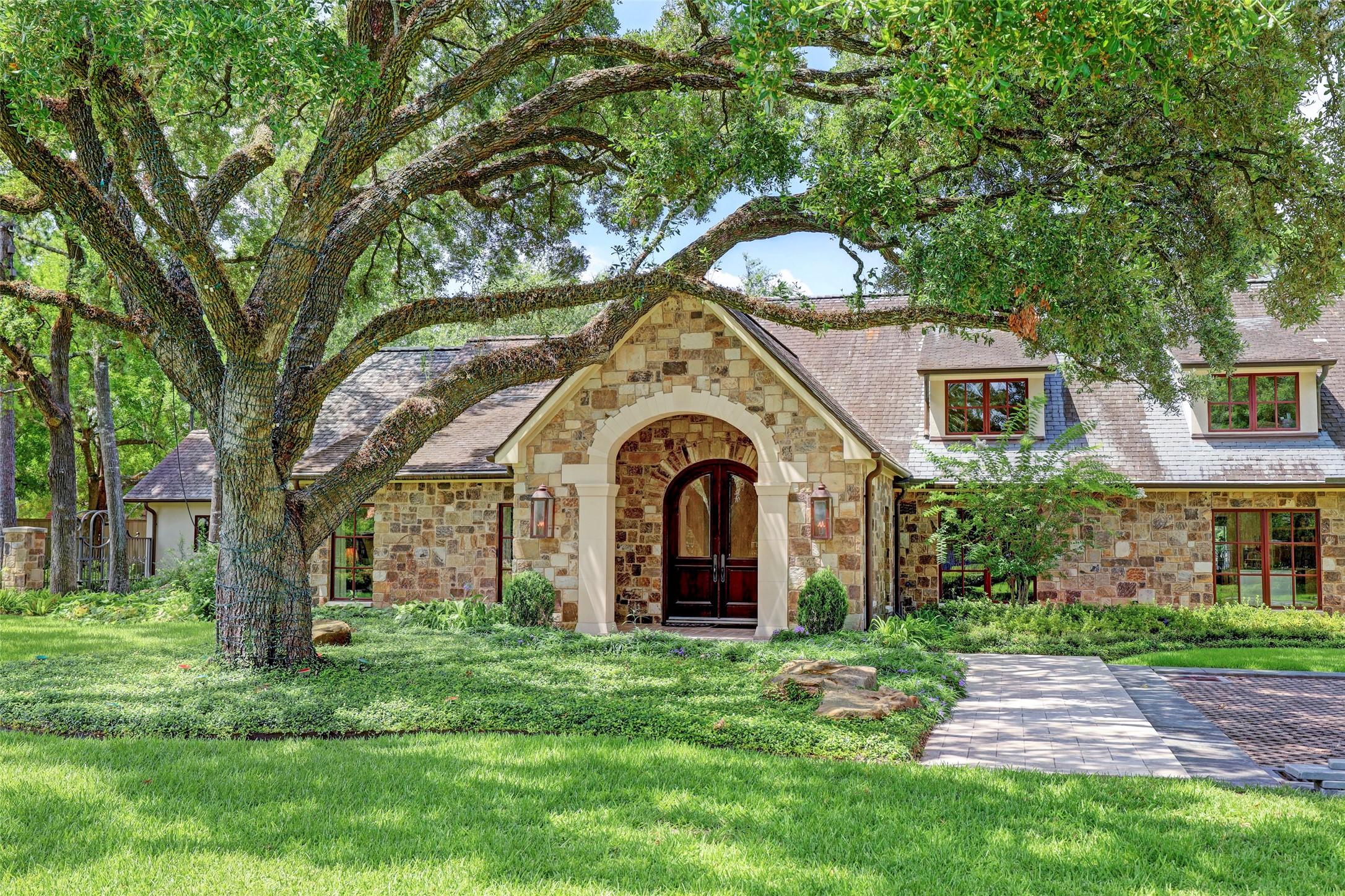 Lovely front entry with large covered porch.
