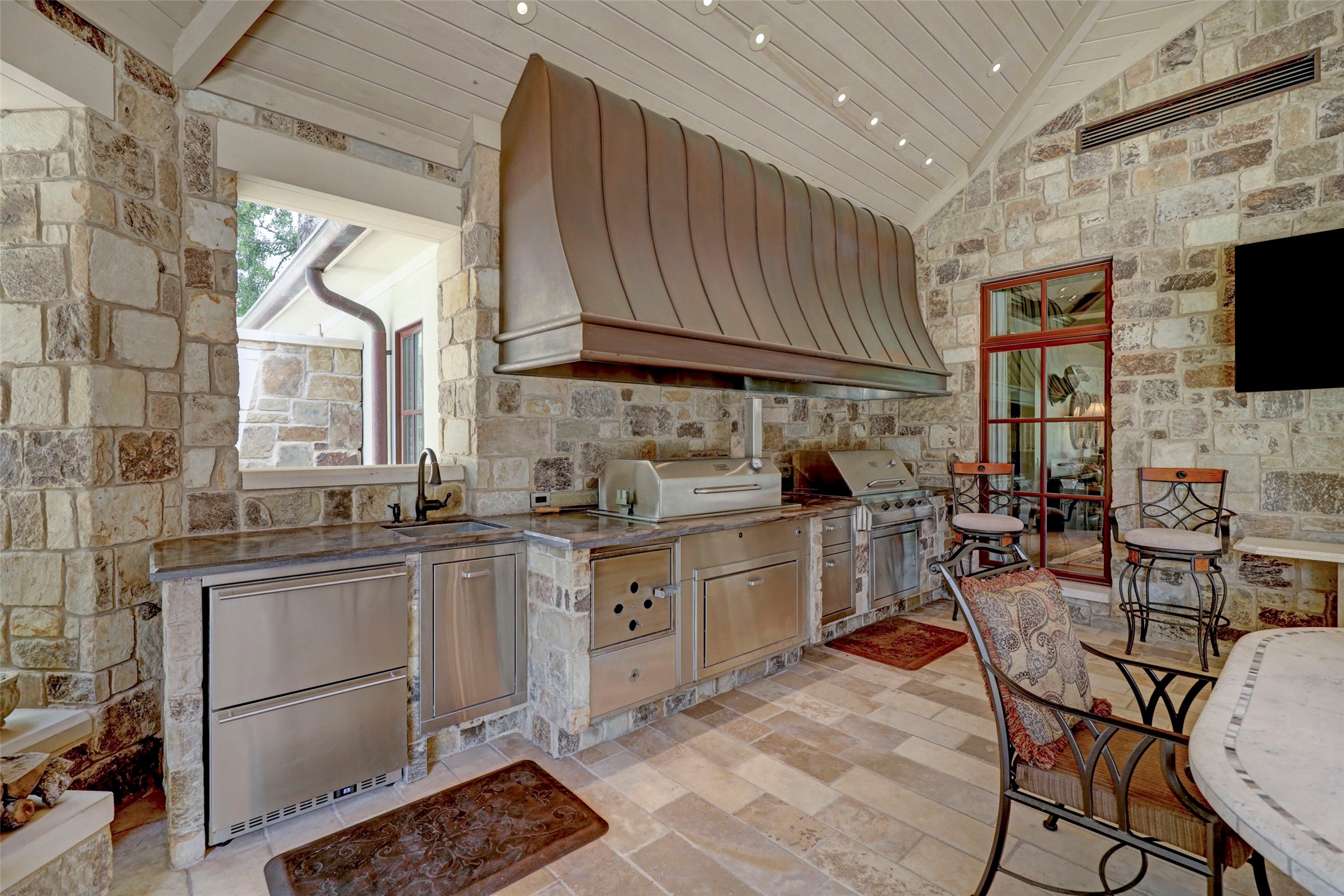 One of a kind outdoor kitchen with everything you need for the weekend.