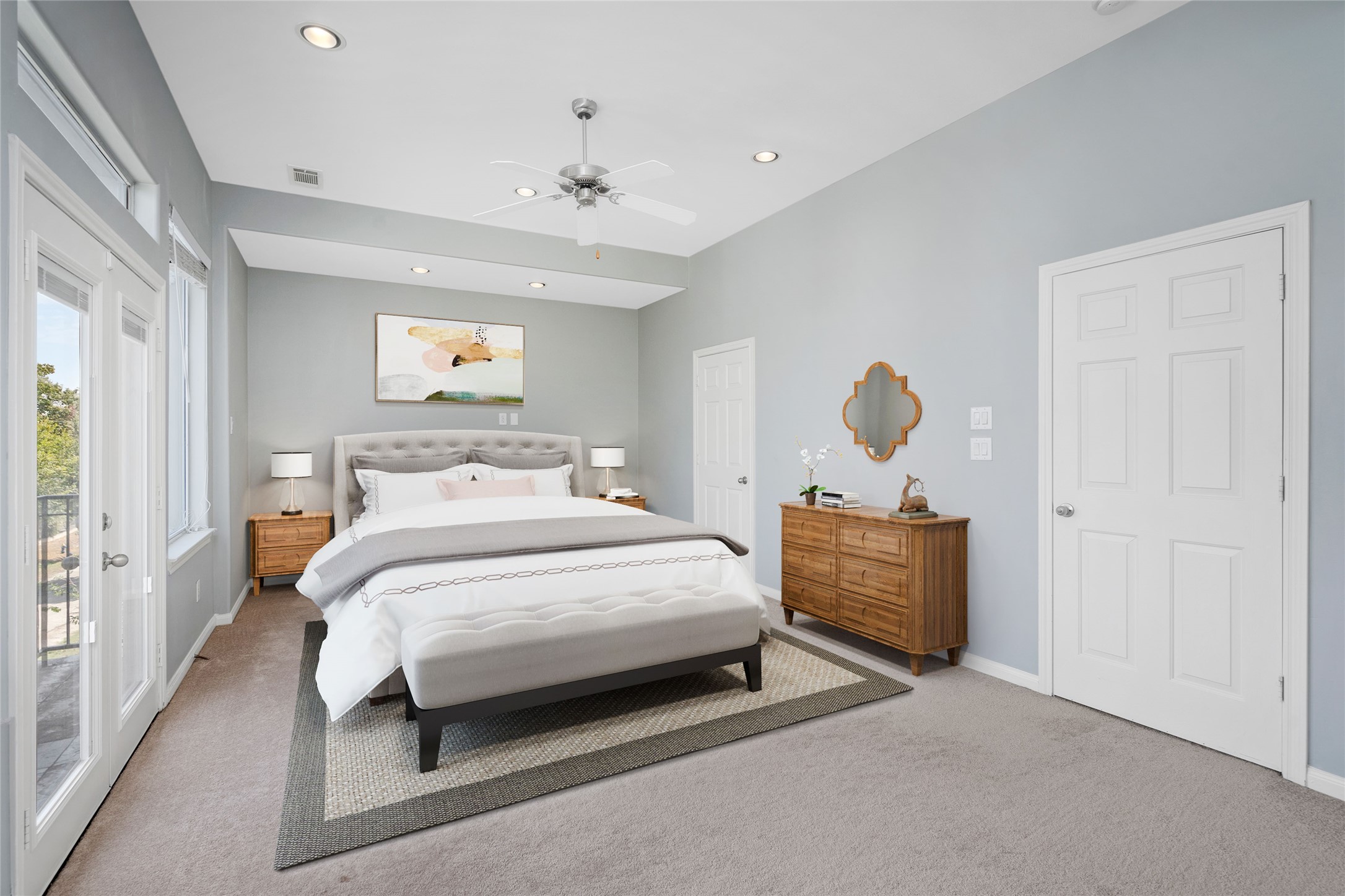 In the primary suite you will be welcomed by a beautiful green view and more natural lighting. *Virtual staging has been added*