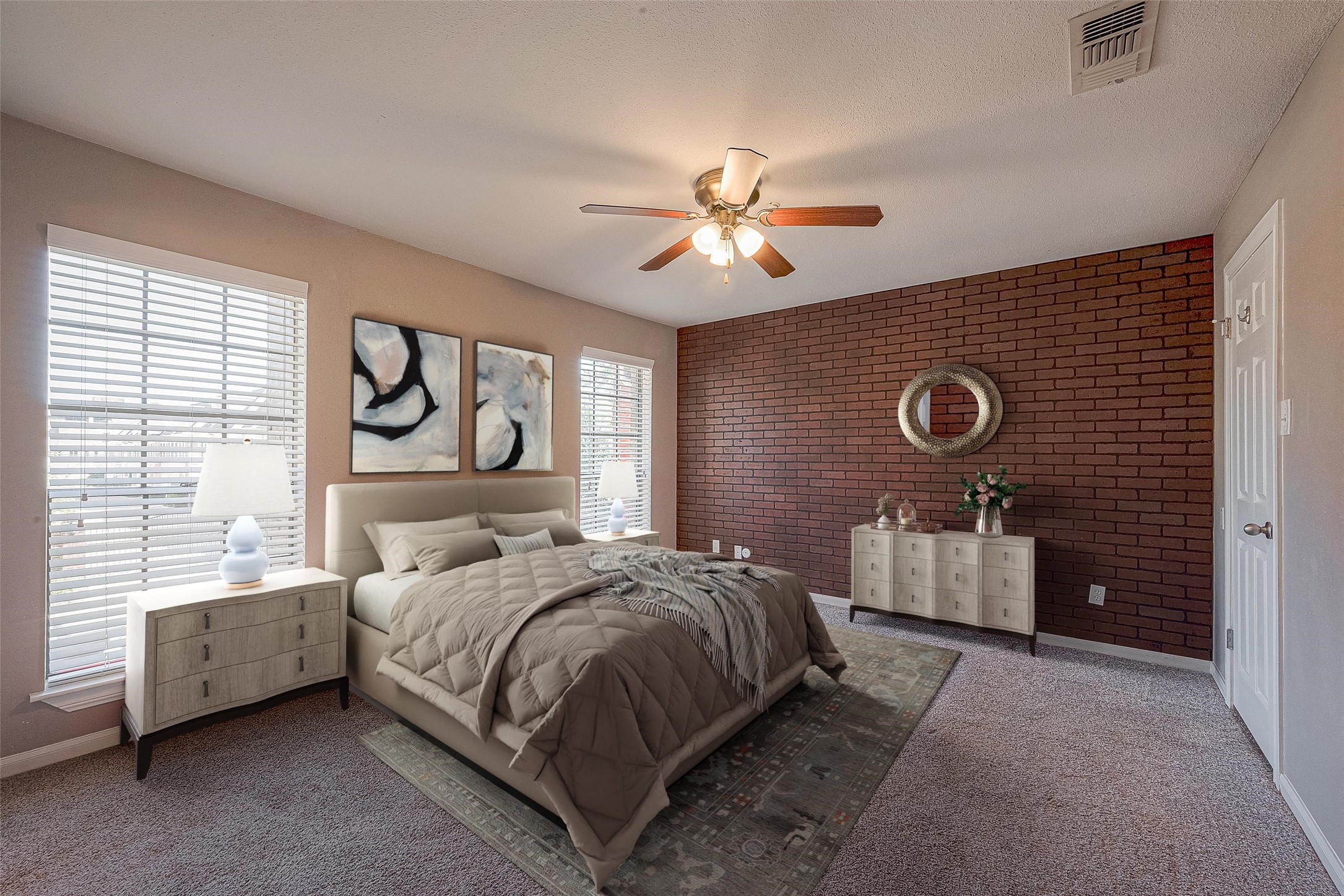 Primary bedroom with views onto Augusta. Virtually staged. Faux brick panel on wall.