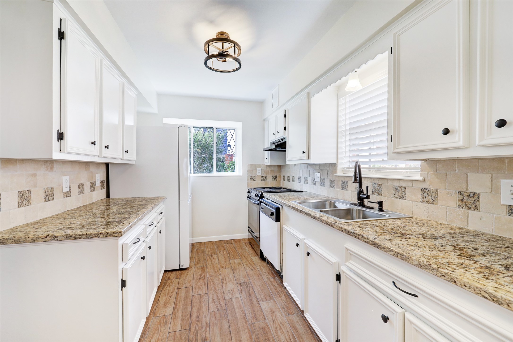 Warm Inviting Kitchen with New Appliances