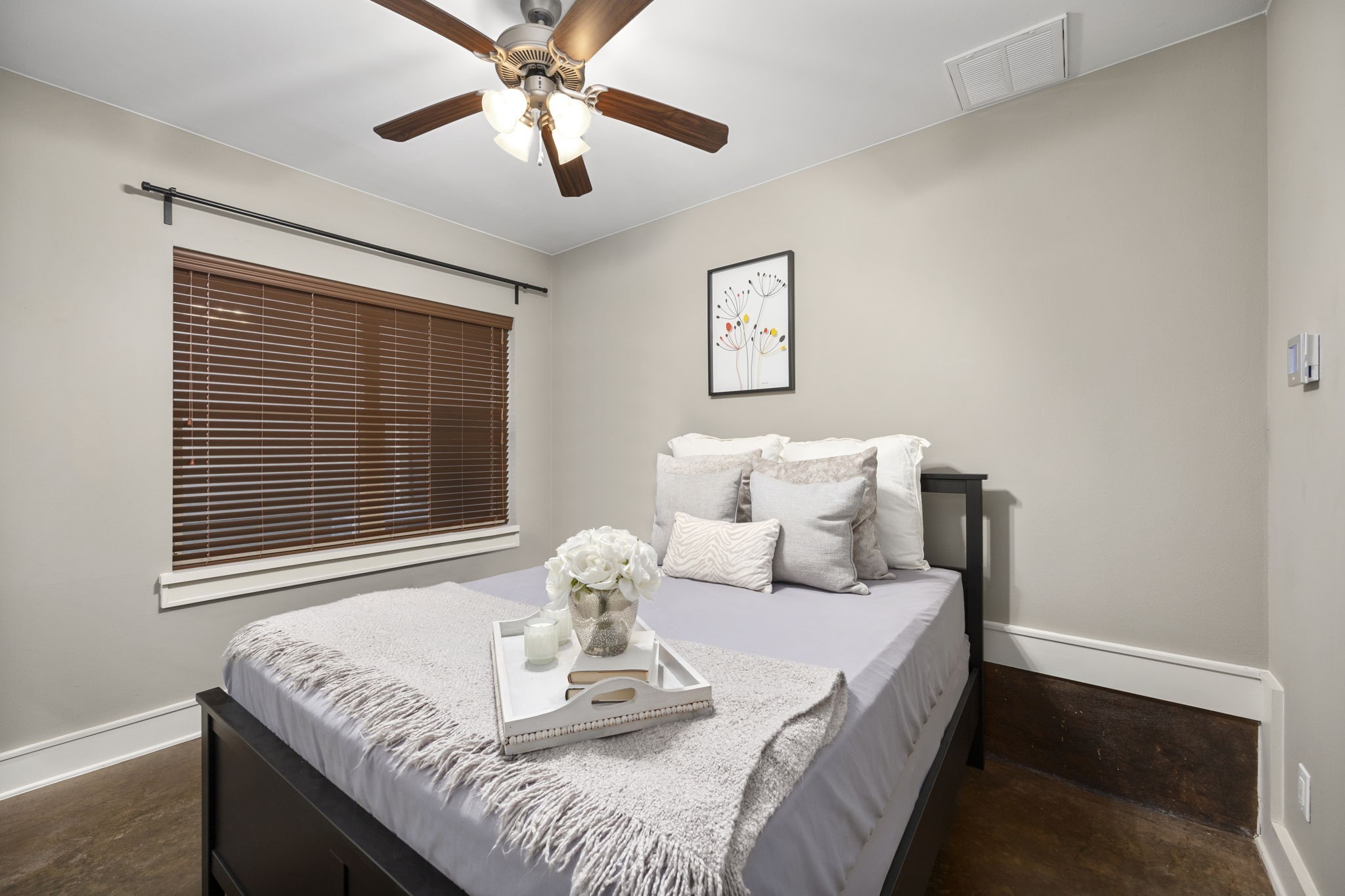 This secondary bedroom is located on the 1st floor. Lots of natural light, high ceilings and a ceiling fan! 322 Patterson St., Houston, TX  77007